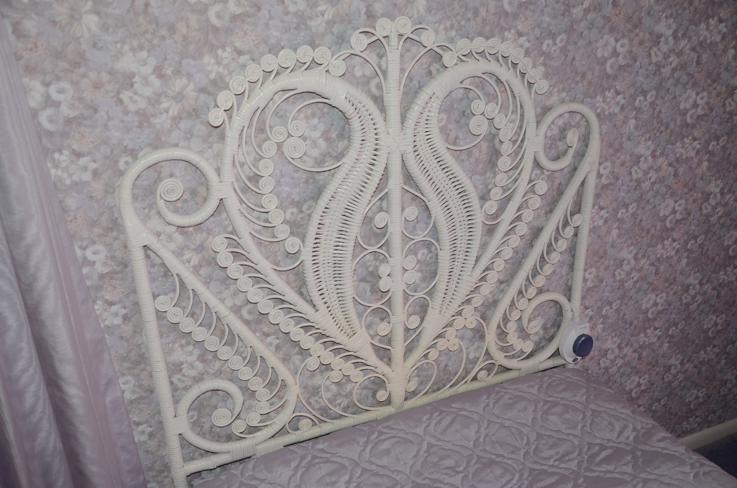 Pair of Twin White Wicker Beds with Violet Linens