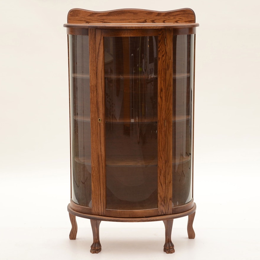 Round Front Oak Curio Cabinet