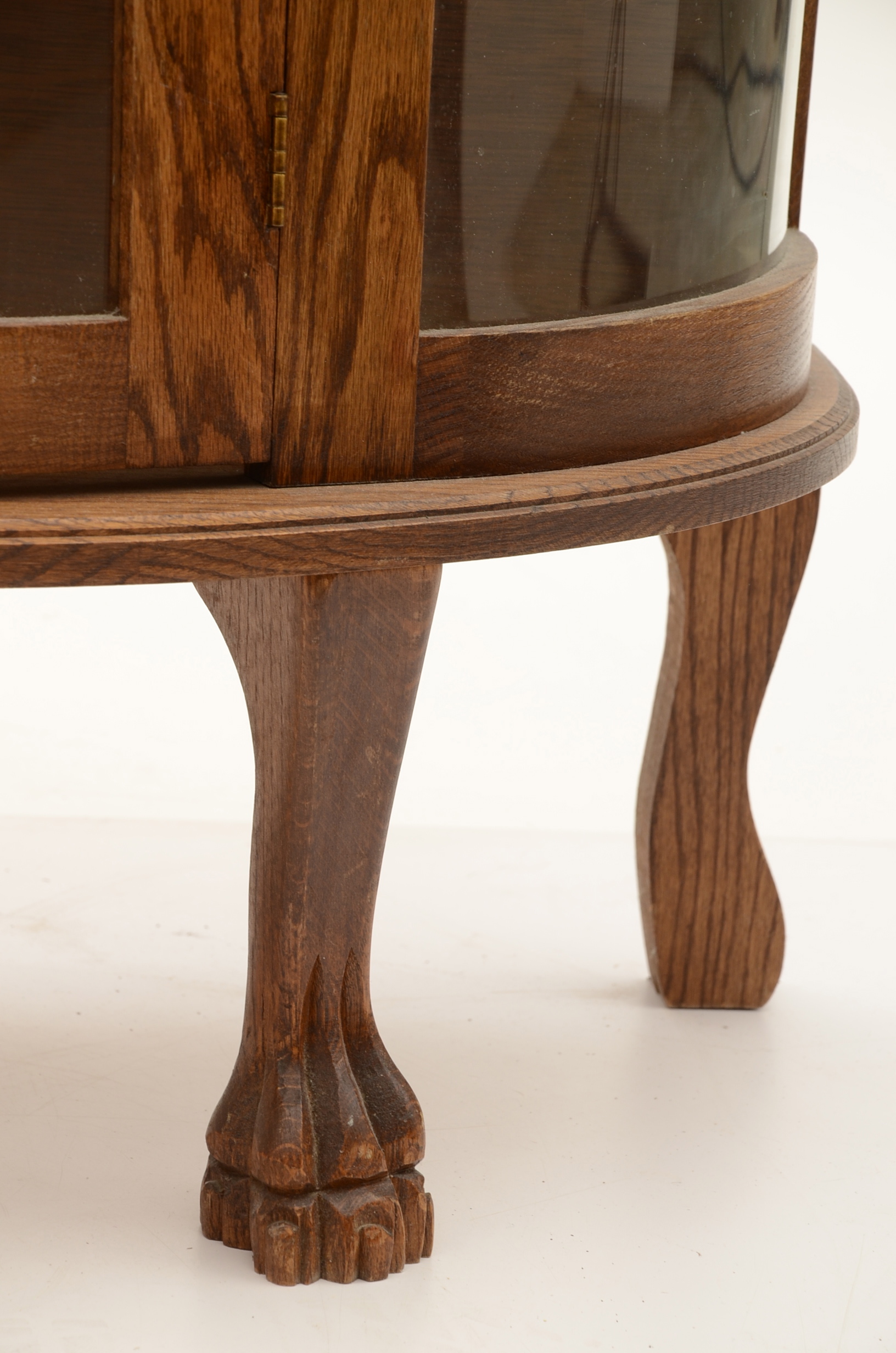Round Front Oak Curio Cabinet
