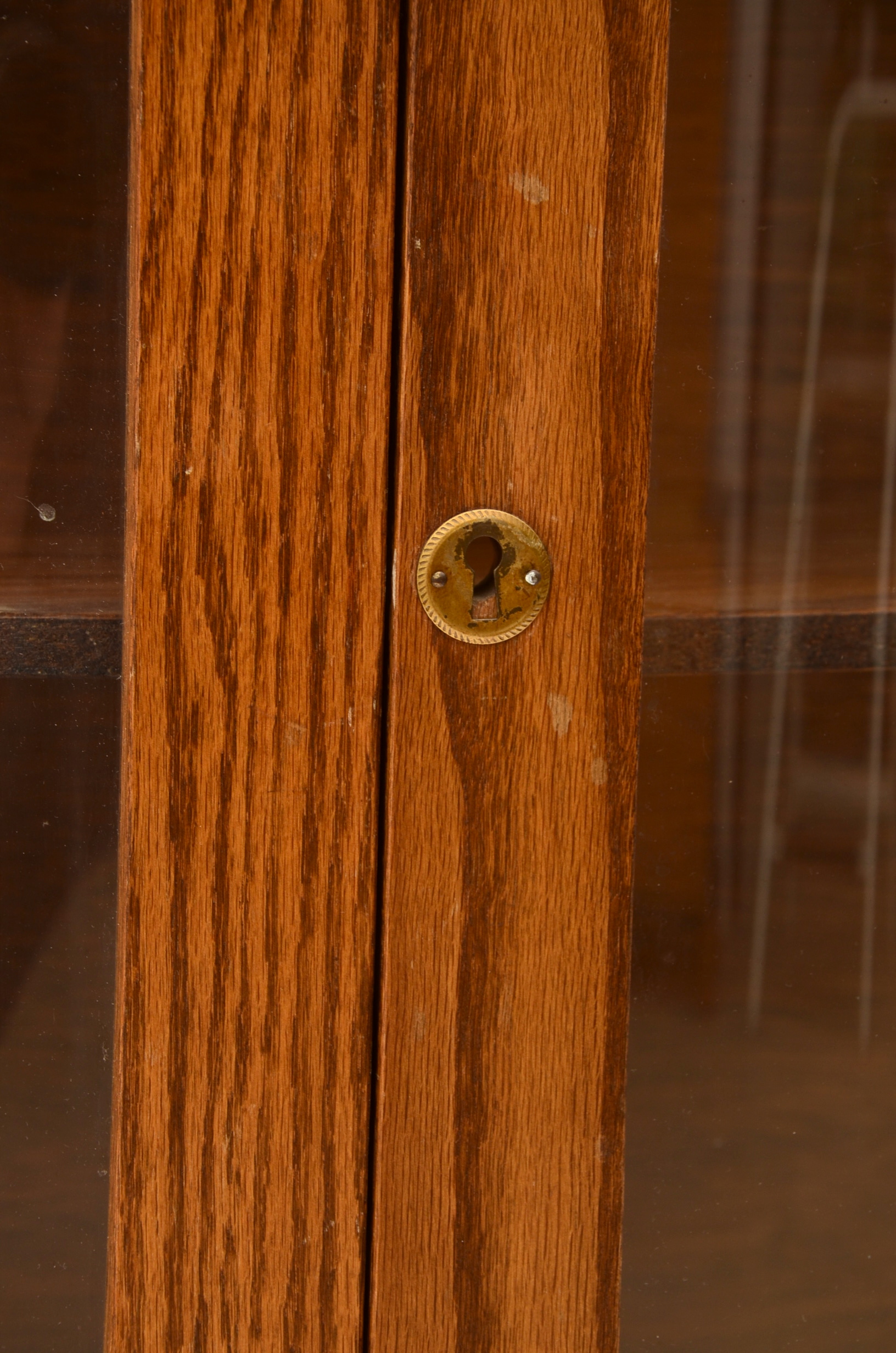 Round Front Oak Curio Cabinet