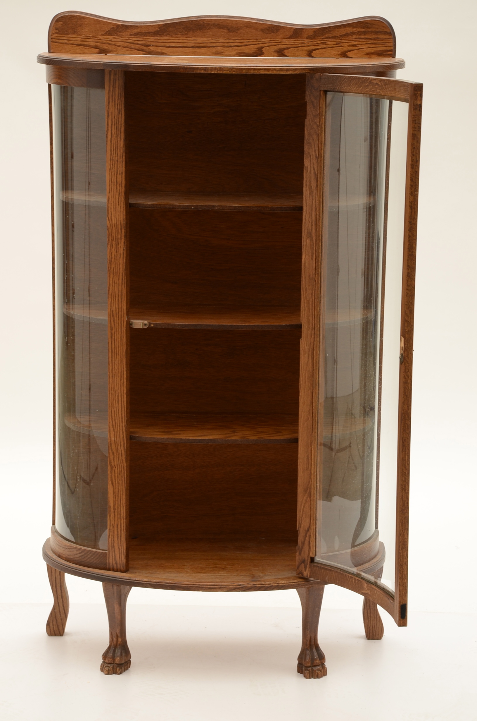 Round Front Oak Curio Cabinet