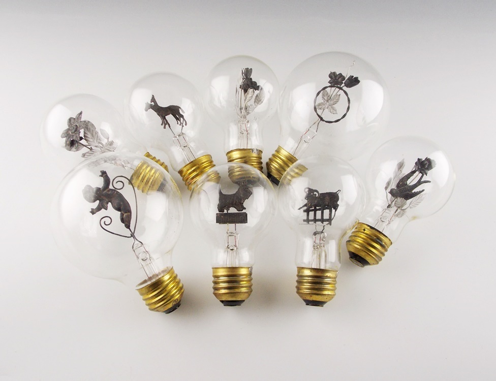 Rare 1930's Aerolux Light Bulbs with Interior Figures That Glow