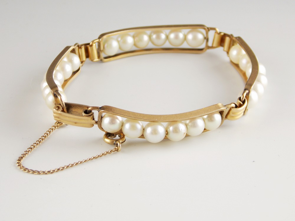 Strand of Multicolored Freshwater Pearls and Two Bracelets