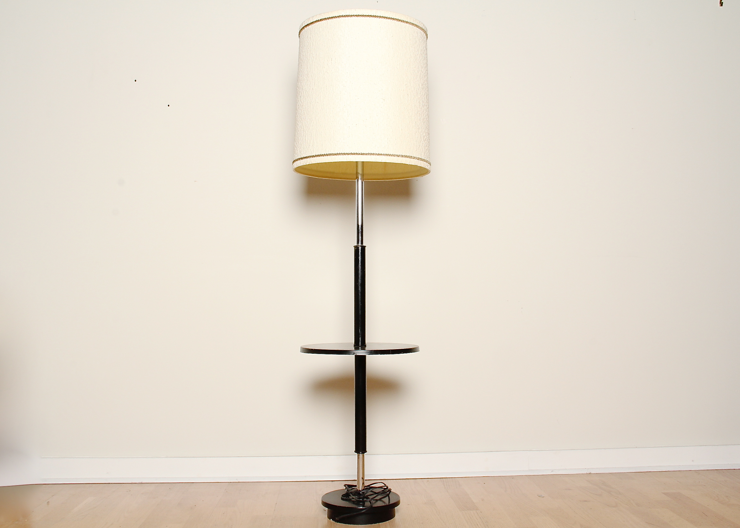 Modern Black and Chrome Floor Lamp with Round Shelf
