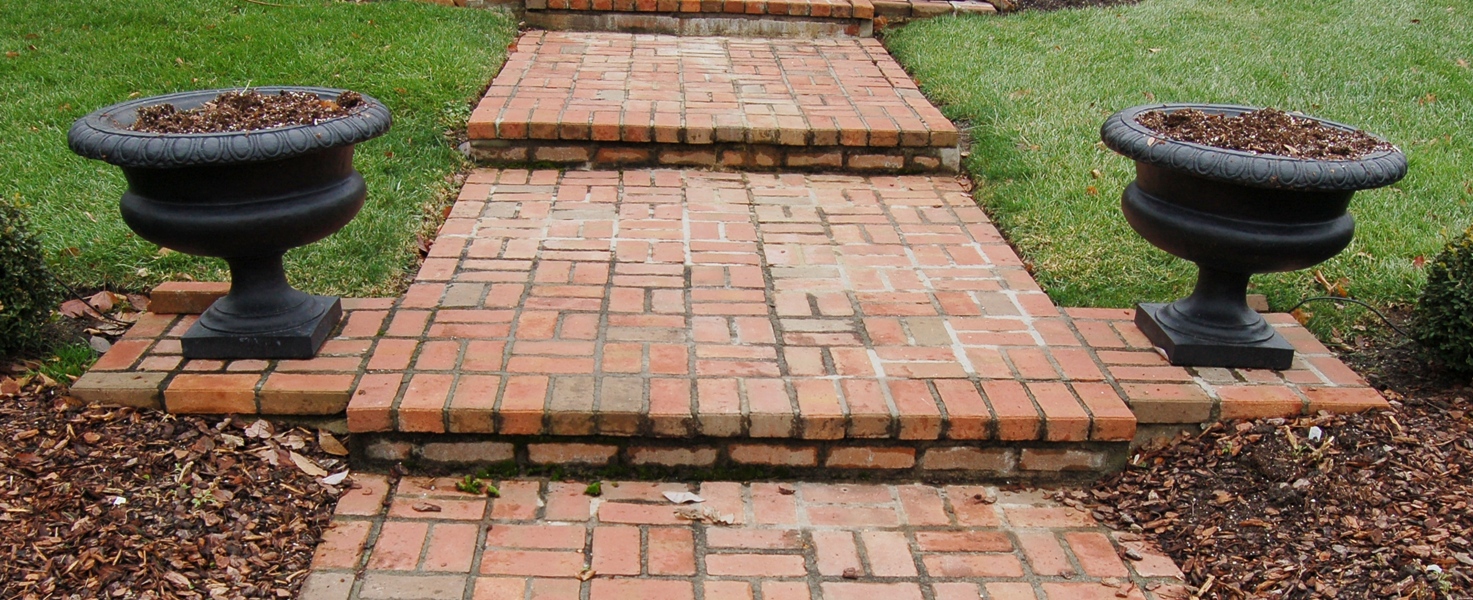 Pair of Black Urn-Shaped Concrete Planters