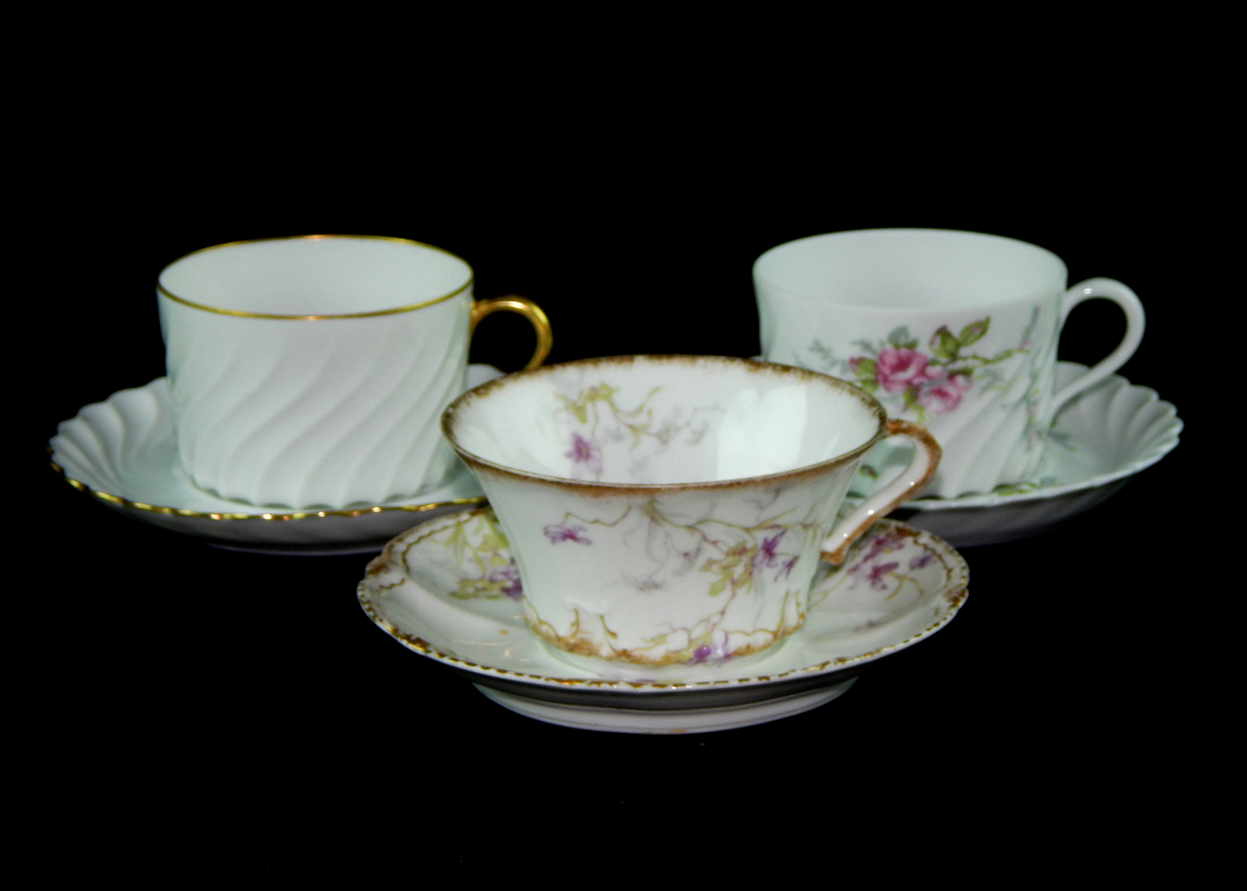 Three Limoges Cups and Saucers