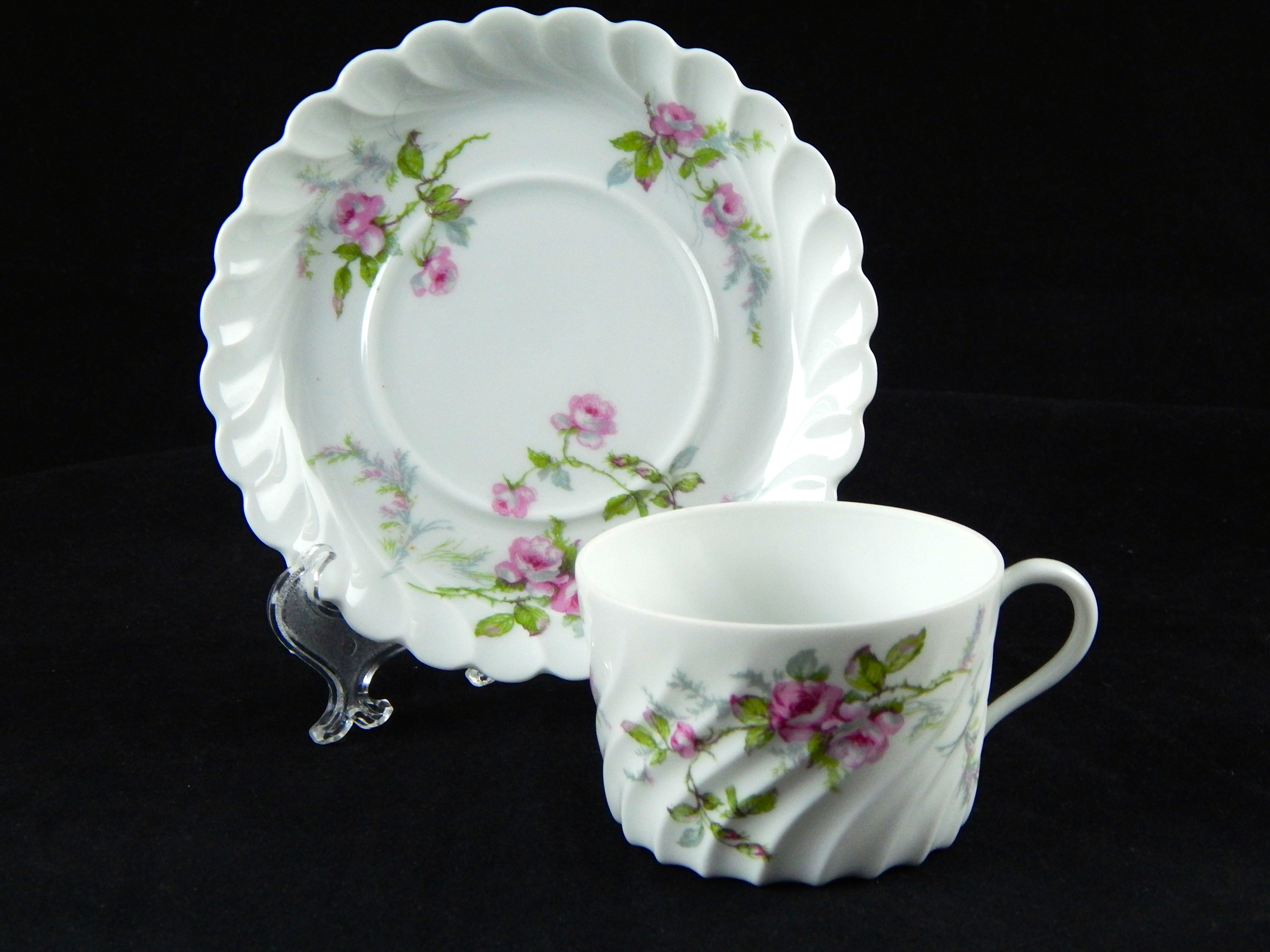 Three Limoges Cups and Saucers