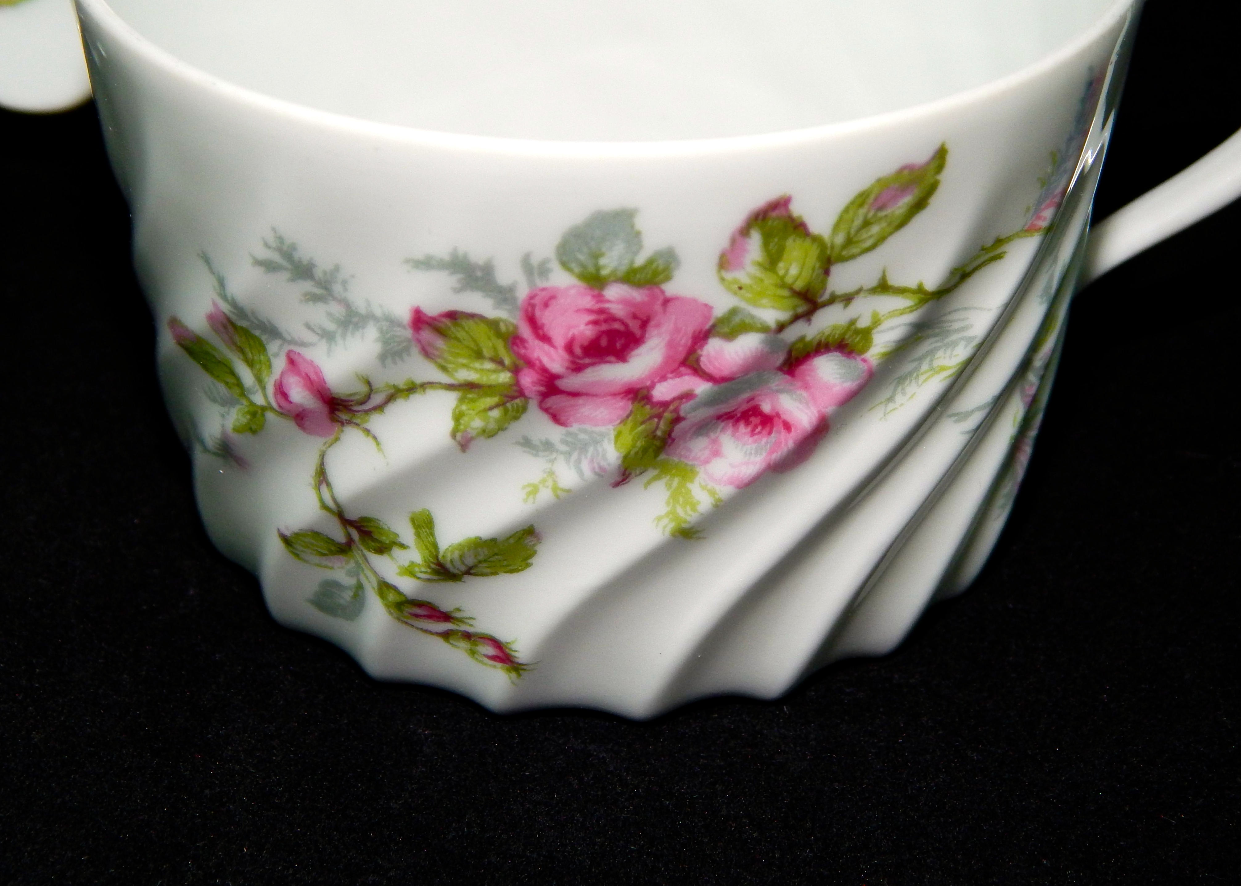 Three Limoges Cups and Saucers