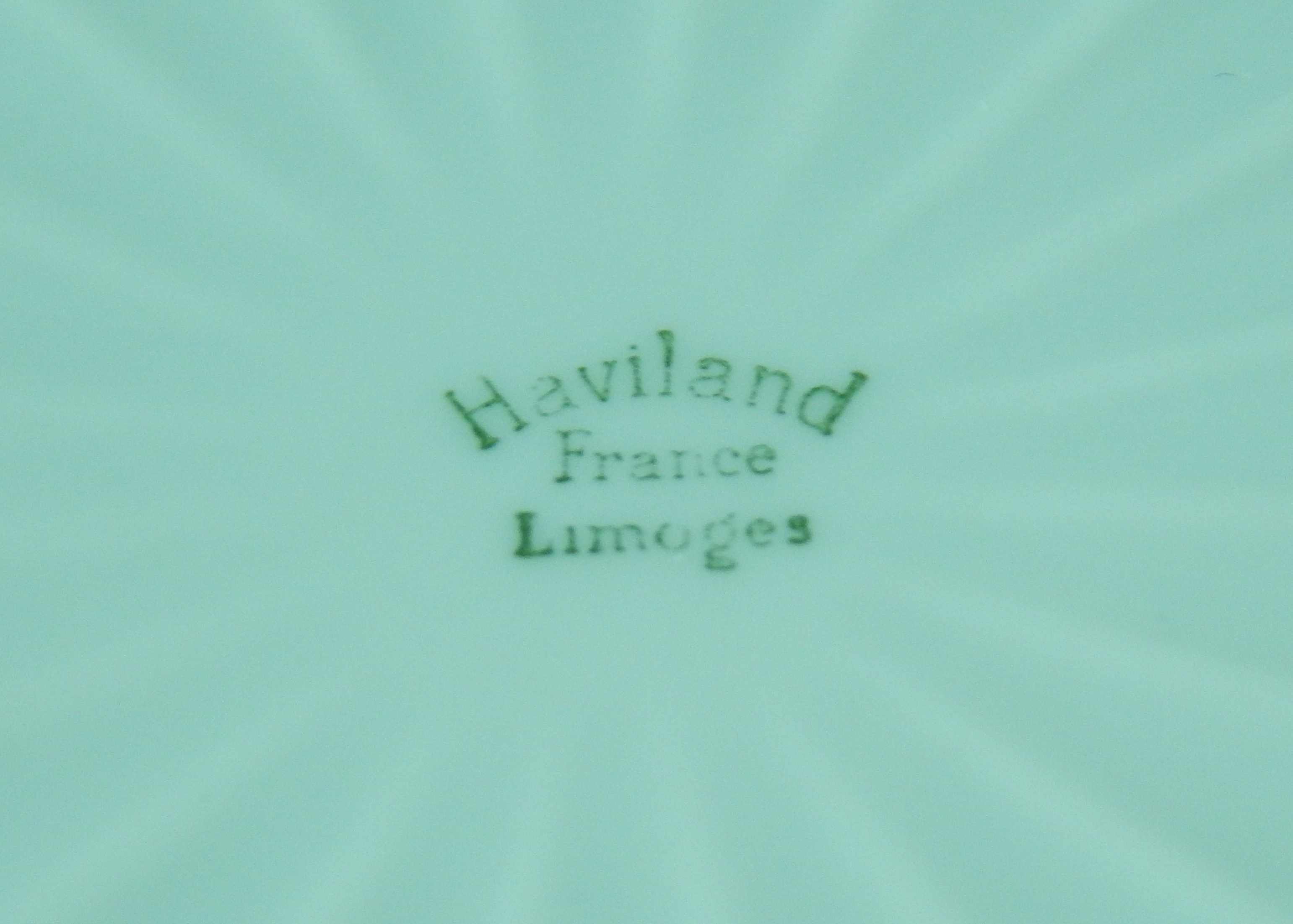 Three Limoges Cups and Saucers