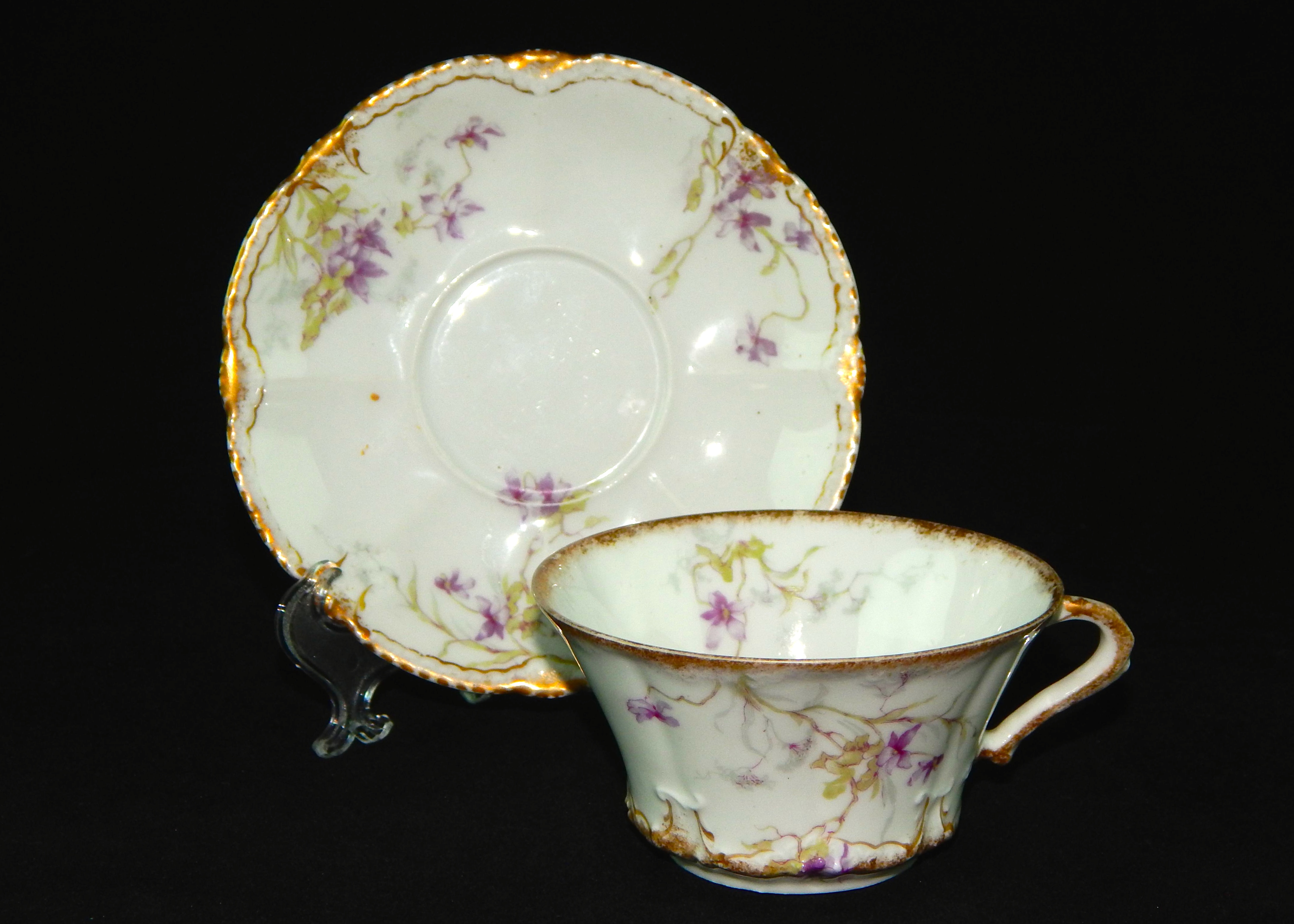Three Limoges Cups and Saucers