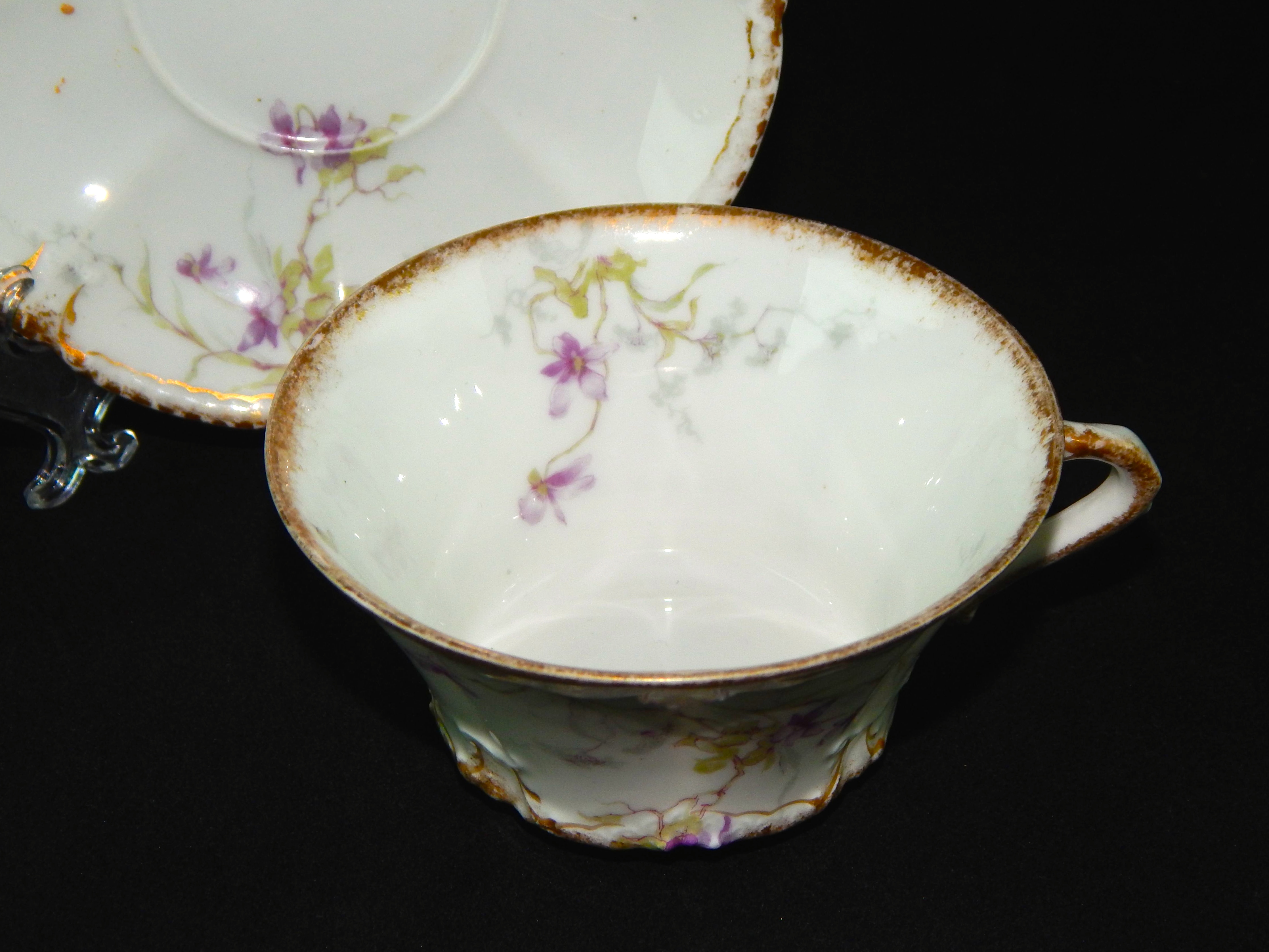 Three Limoges Cups and Saucers