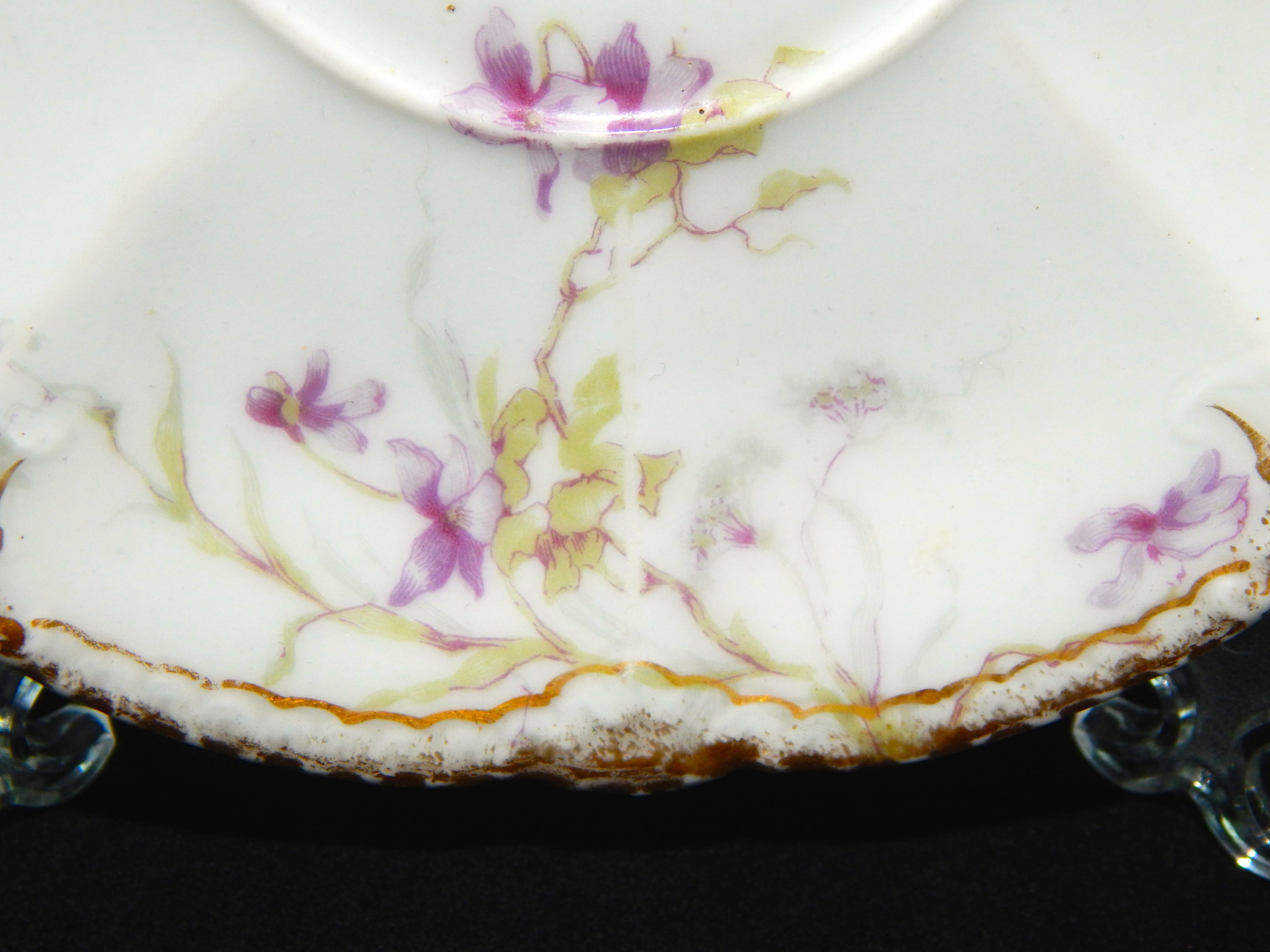 Three Limoges Cups and Saucers