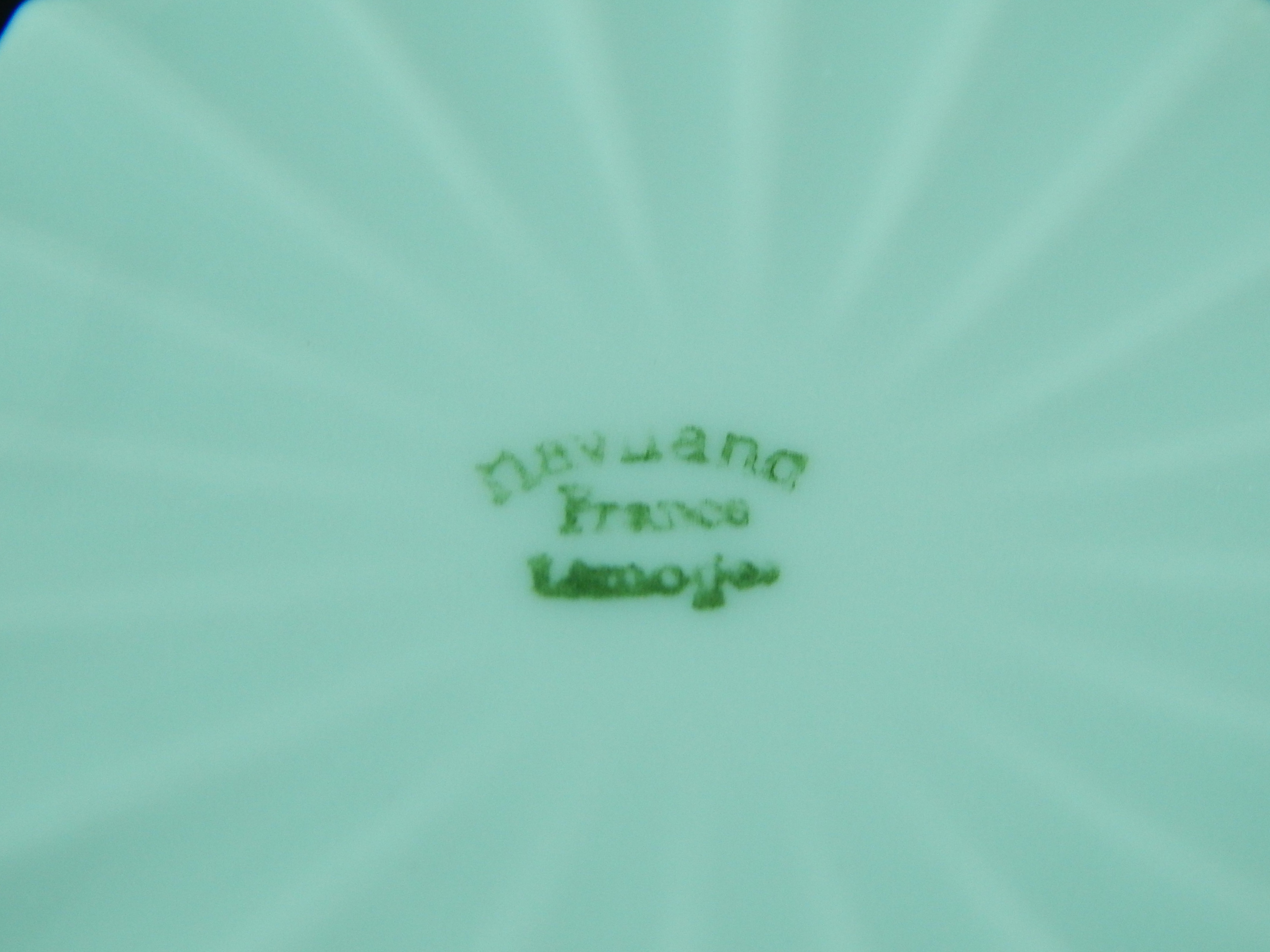 Three Limoges Cups and Saucers