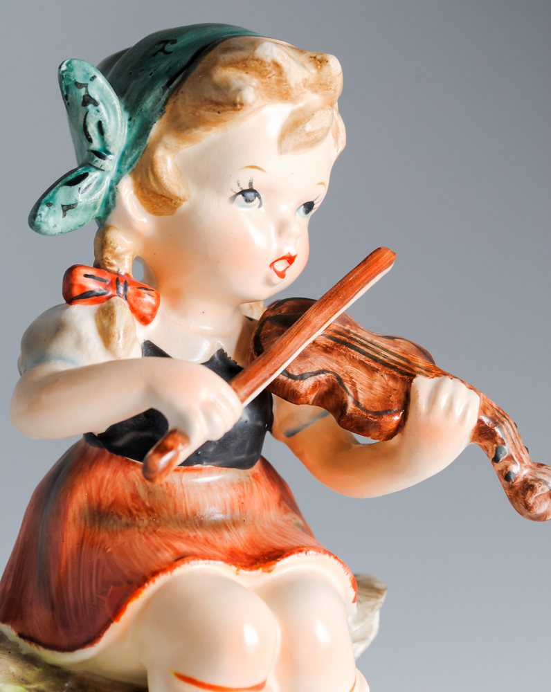 Group of Three Porcelain Little Girl Figurines