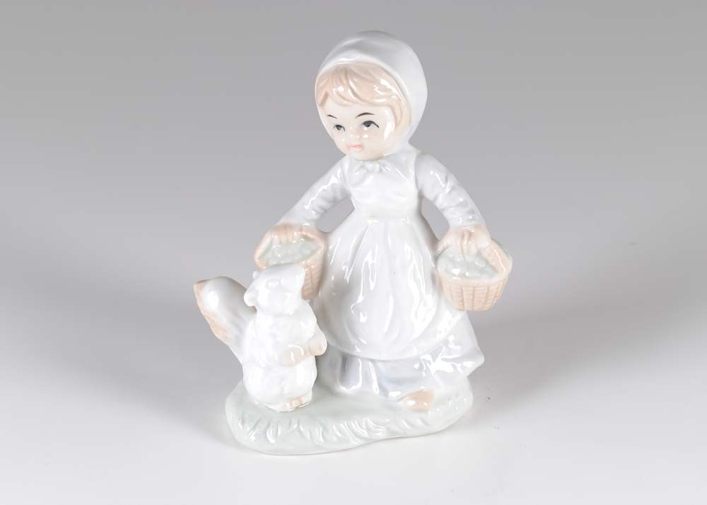 Group of Three Porcelain Little Girl Figurines