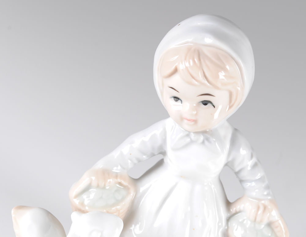 Group of Three Porcelain Little Girl Figurines