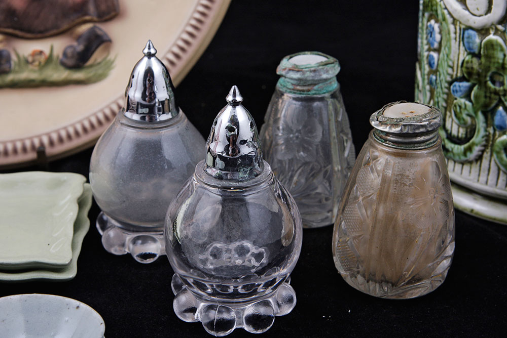 Assortment of Small Plates and Salt and Pepper Shakers