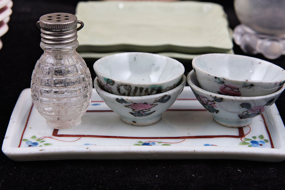 Assortment of Small Plates and Salt and Pepper Shakers