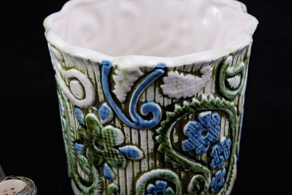 Assortment of Small Plates and Salt and Pepper Shakers