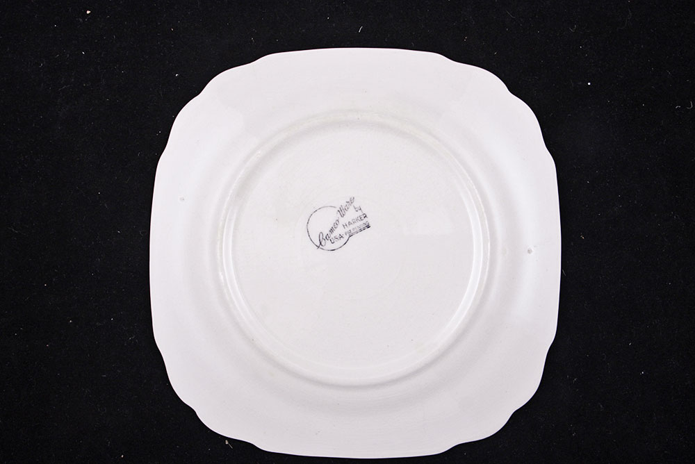 Assortment of Small Plates and Salt and Pepper Shakers