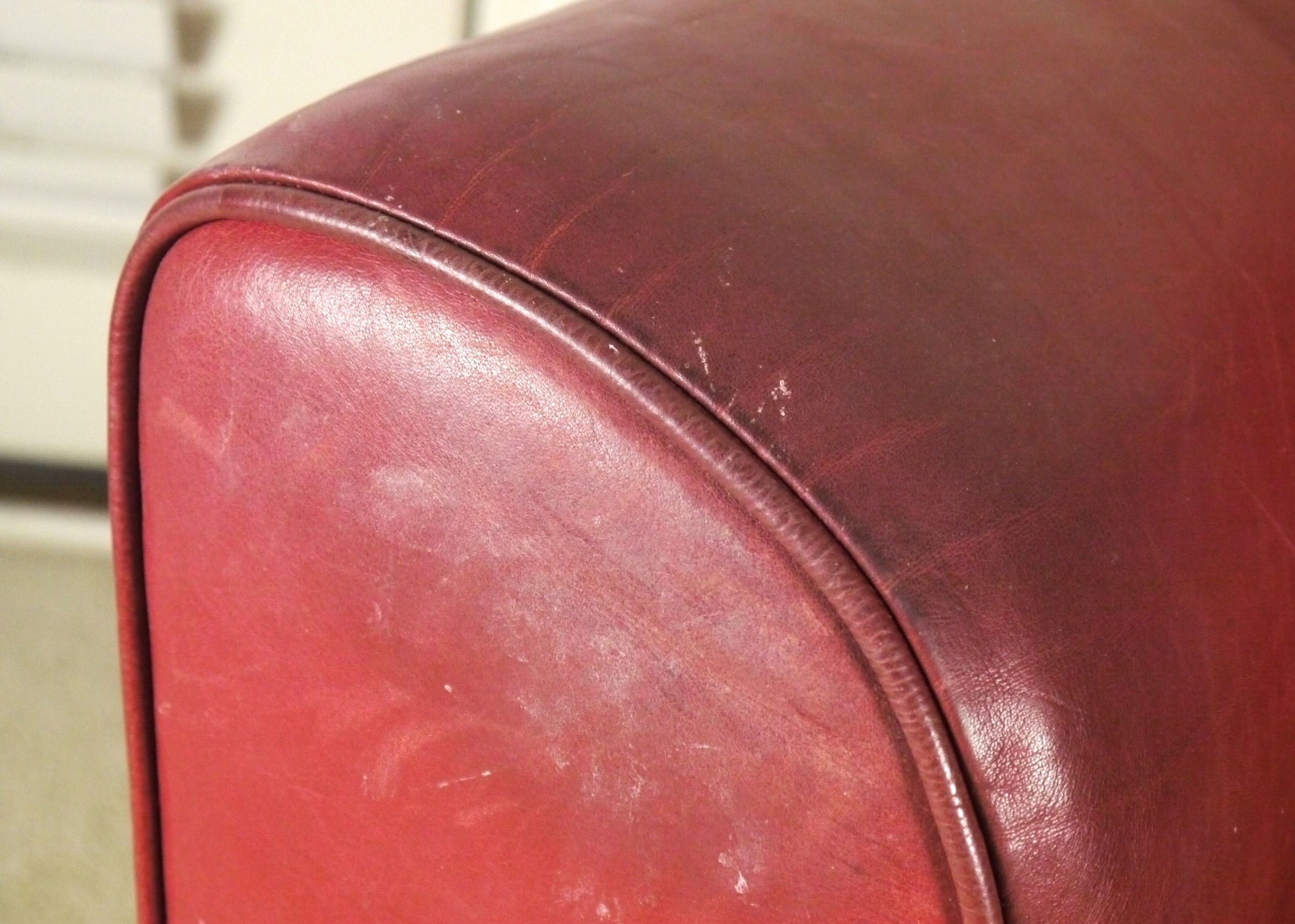 Red Leather Armchair and Ottoman by Natuzzi