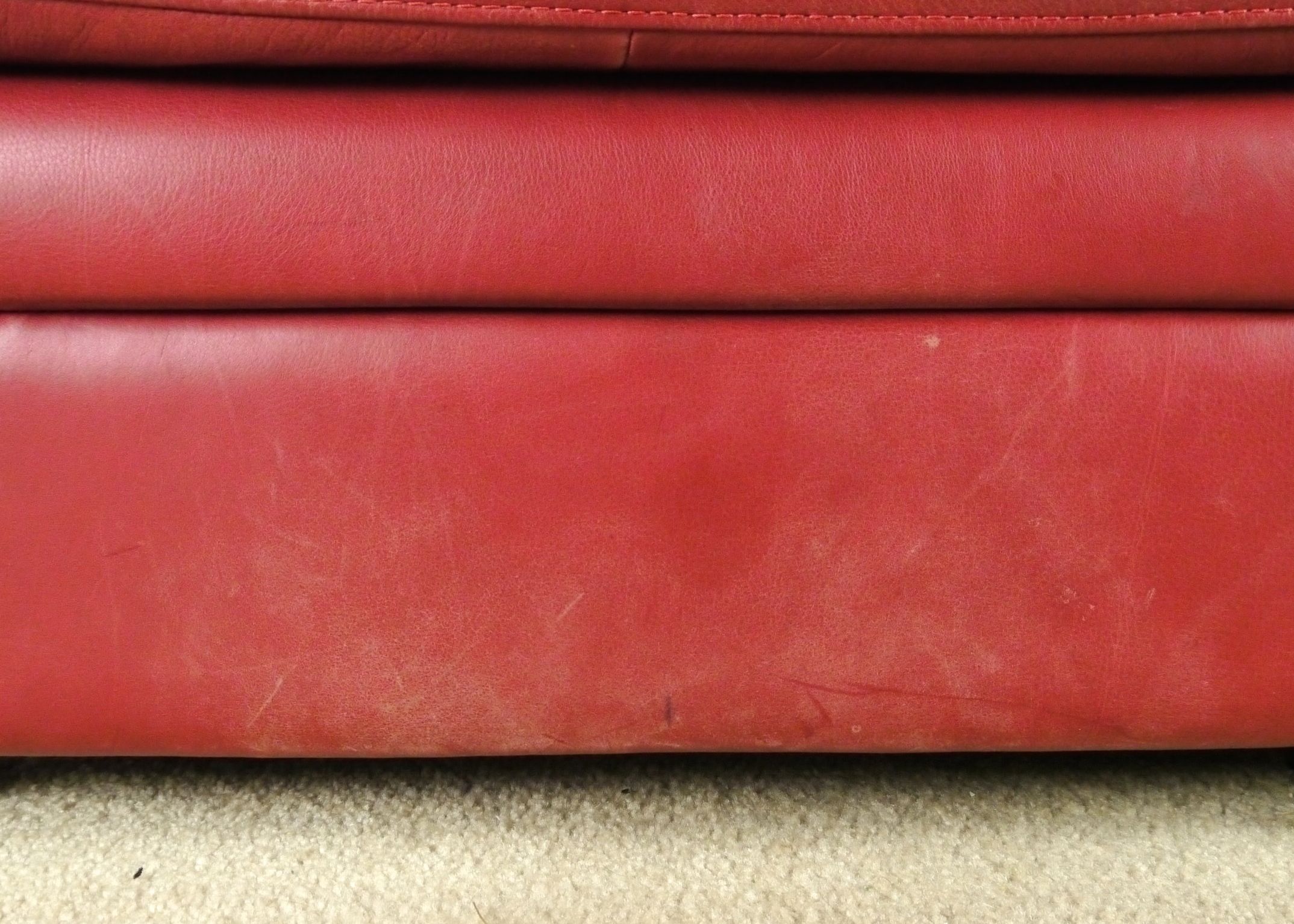 Red Leather Armchair and Ottoman by Natuzzi