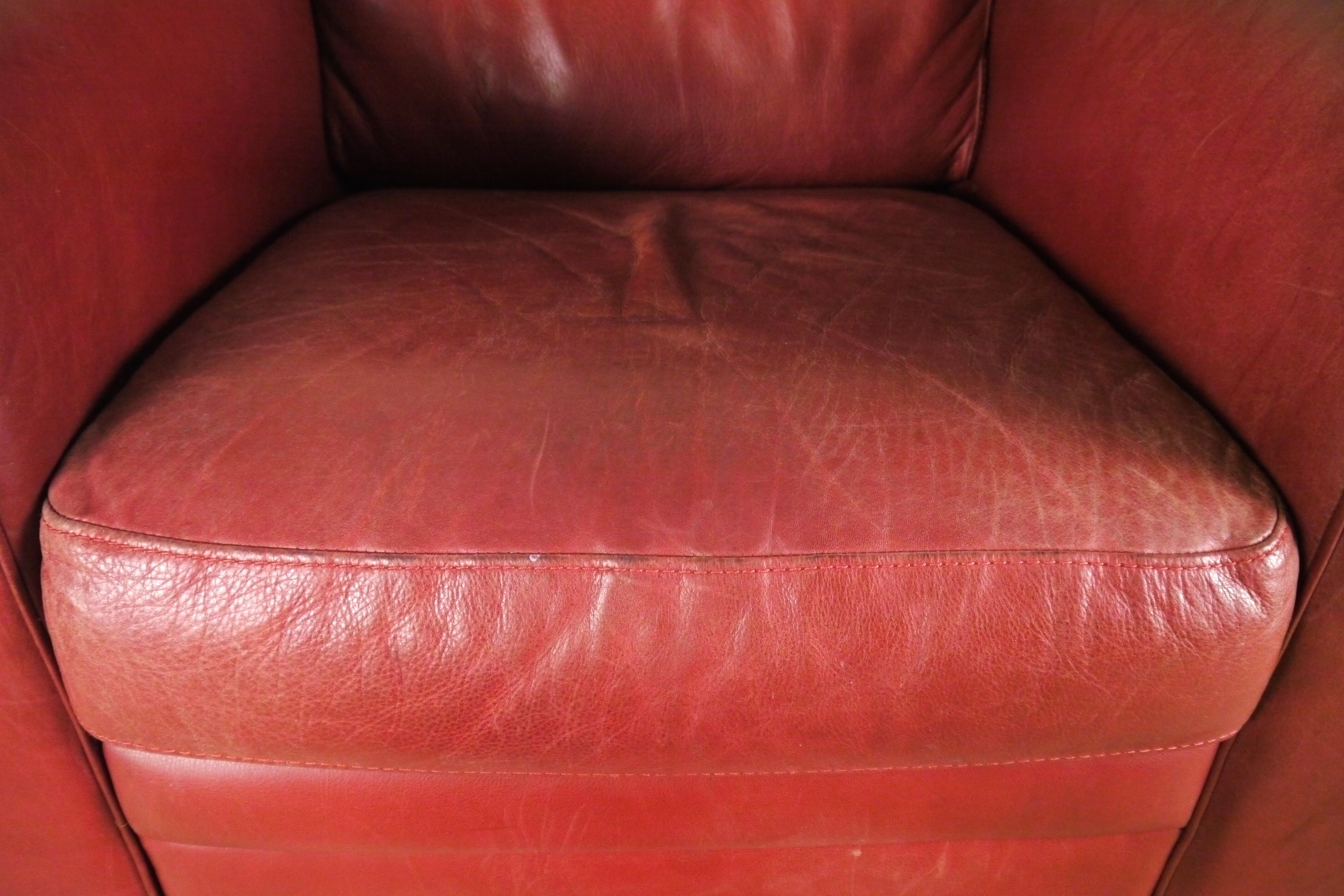 Red Leather Armchair and Ottoman by Natuzzi