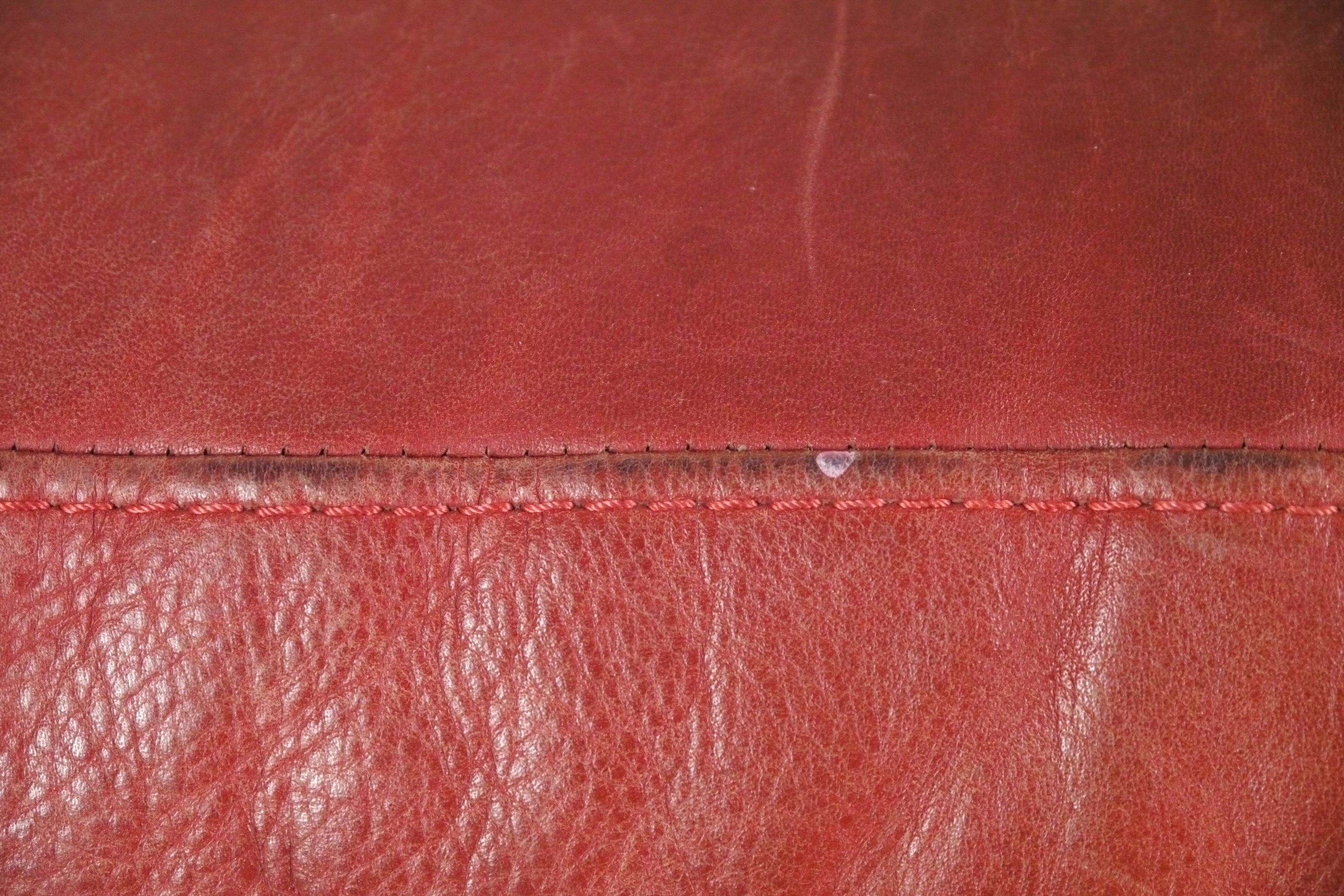 Red Leather Armchair and Ottoman by Natuzzi