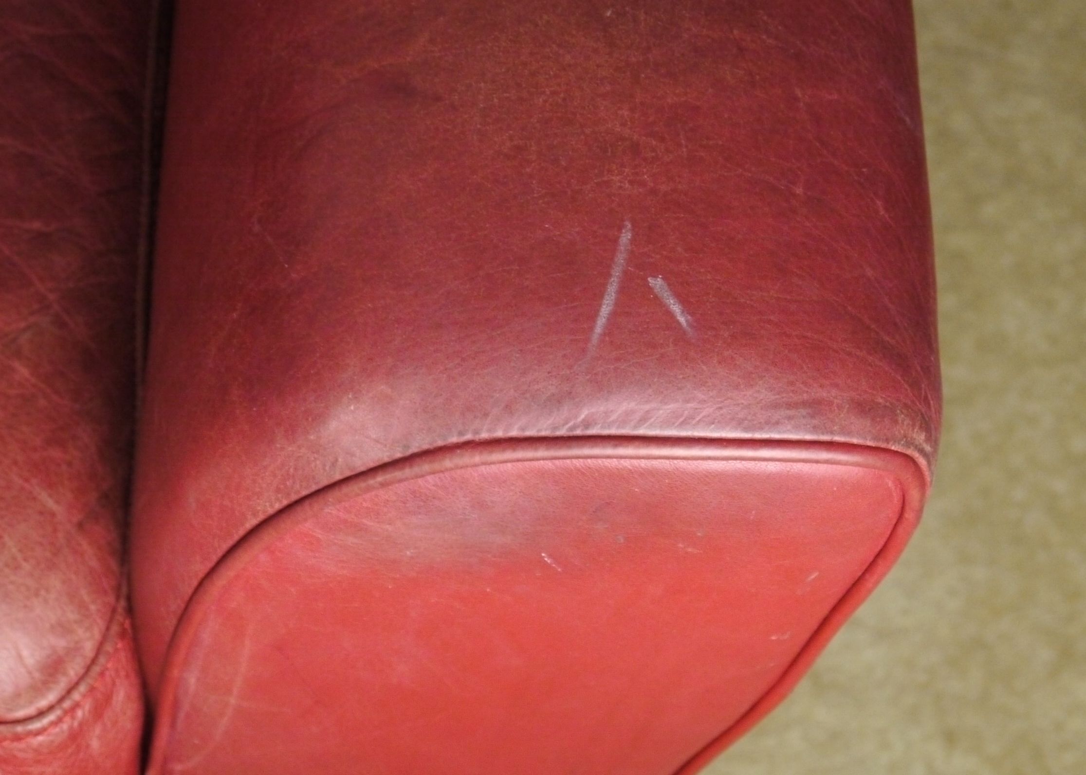 Red Leather Armchair and Ottoman by Natuzzi