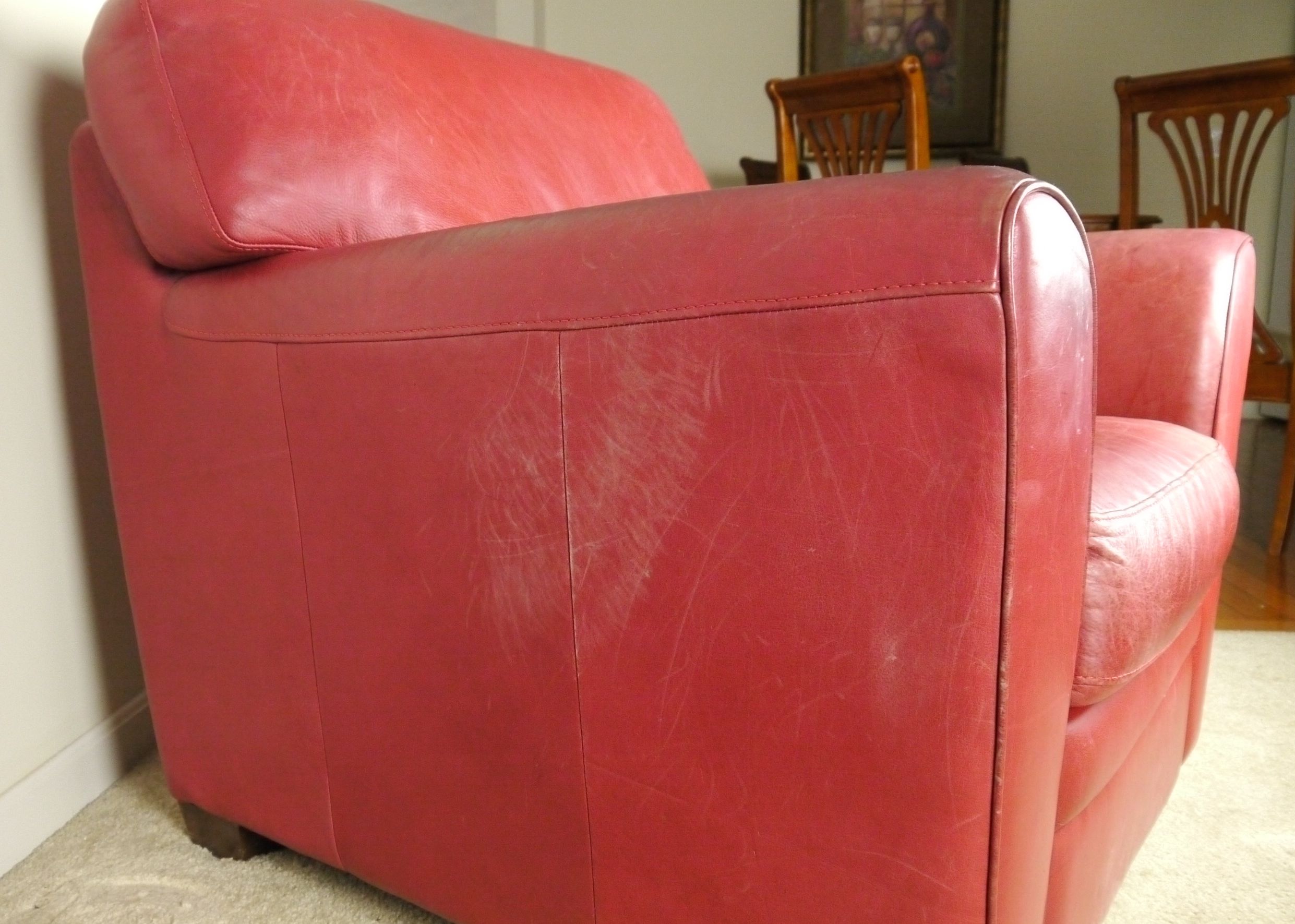 Red Leather Armchair and Ottoman by Natuzzi