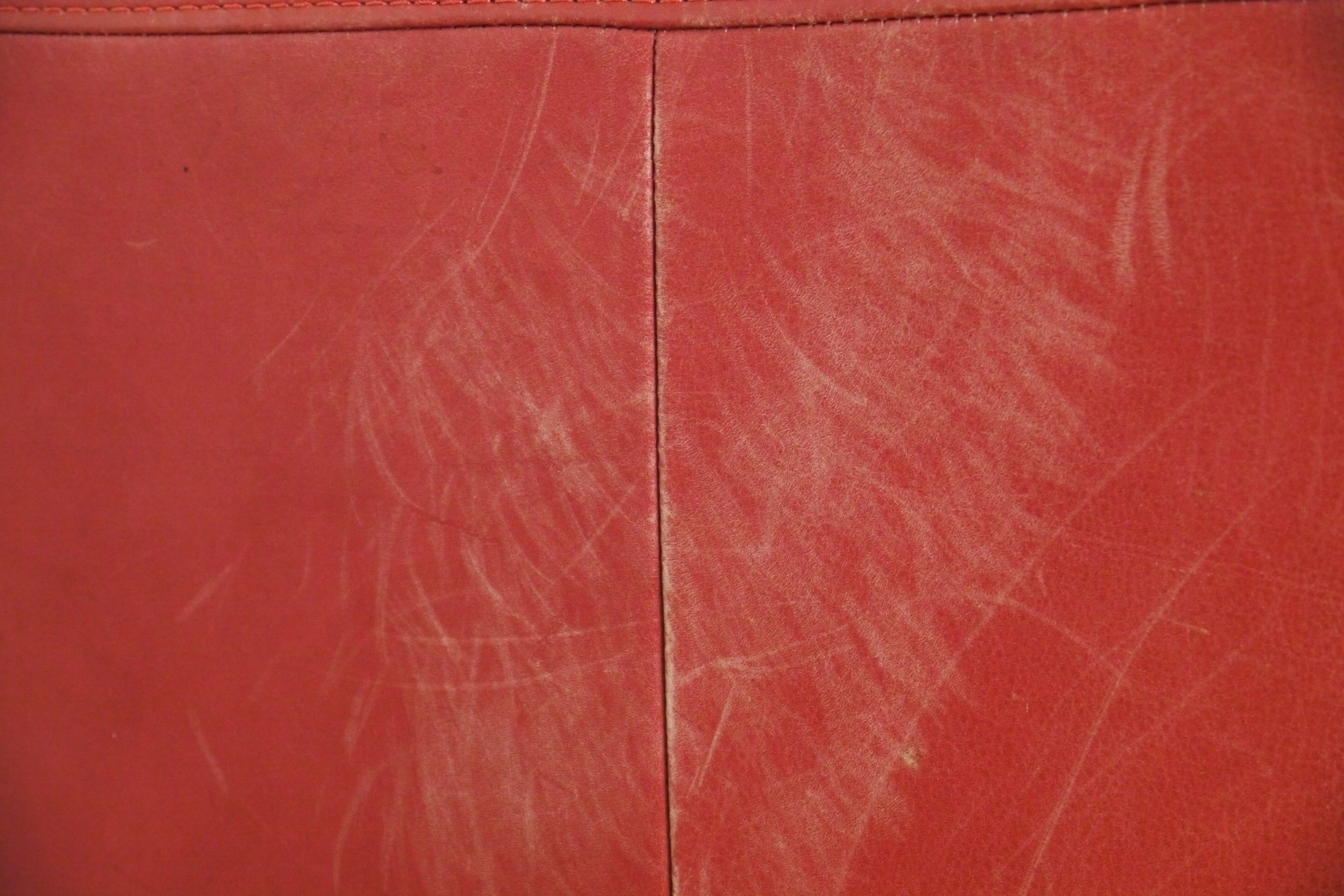 Red Leather Armchair and Ottoman by Natuzzi