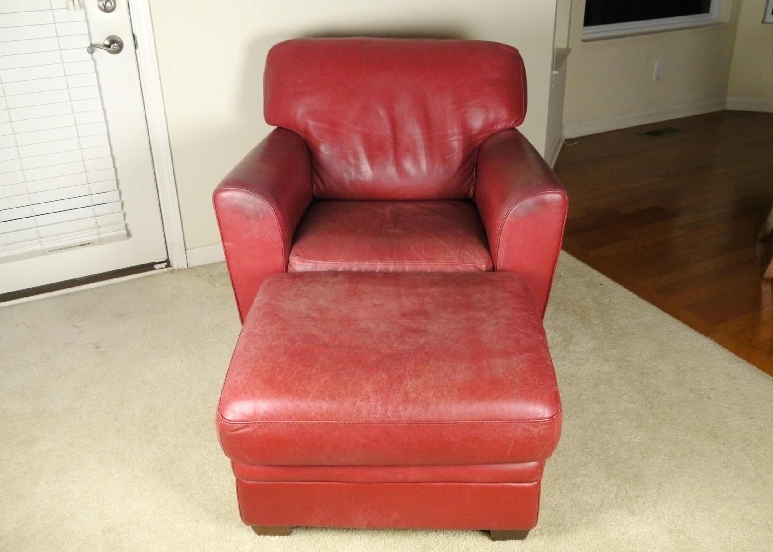 Red Leather Armchair and Ottoman by Natuzzi