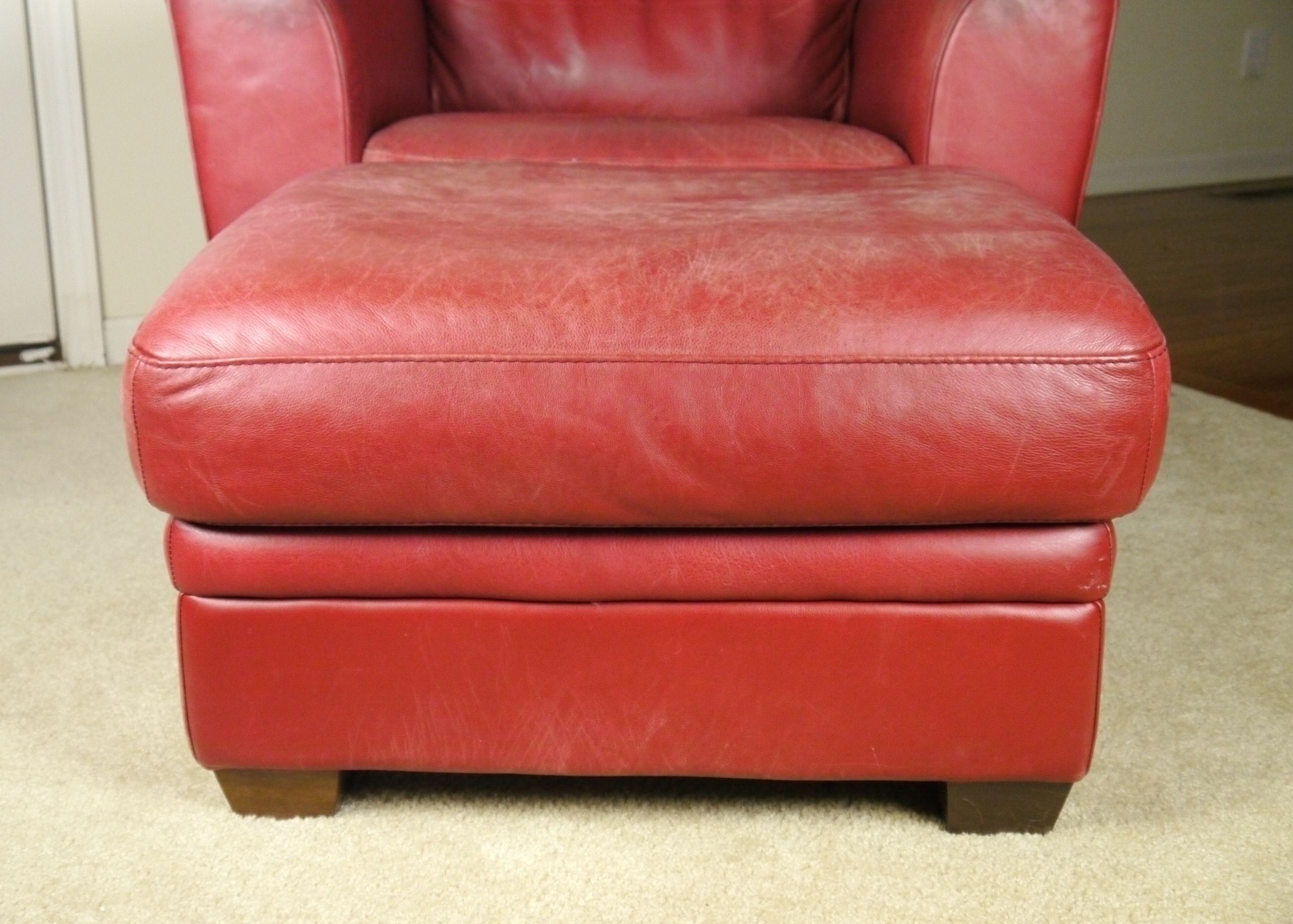 Red Leather Armchair and Ottoman by Natuzzi