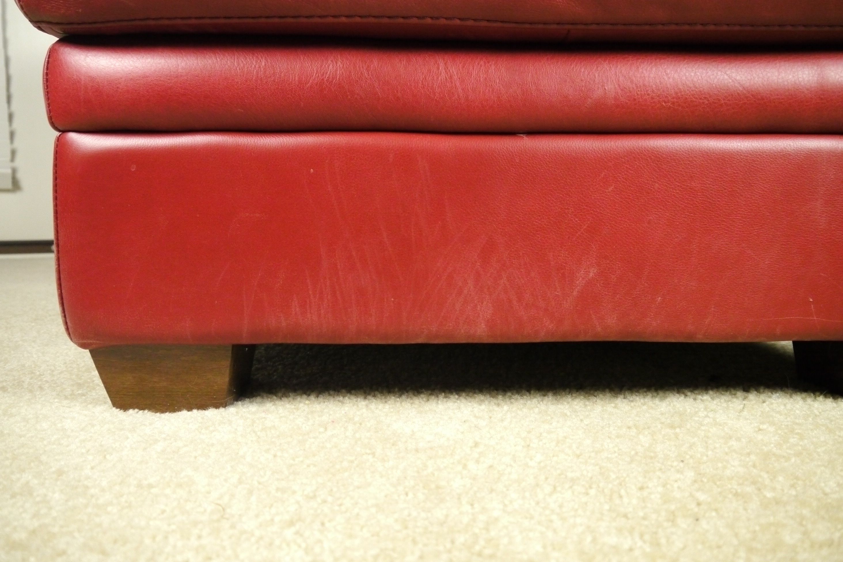 Red Leather Armchair and Ottoman by Natuzzi