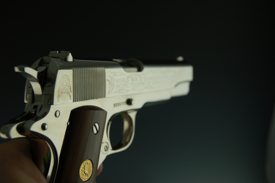 1911 Colt .45 WWII Commemorative Pistol in a Bamboo Like Case