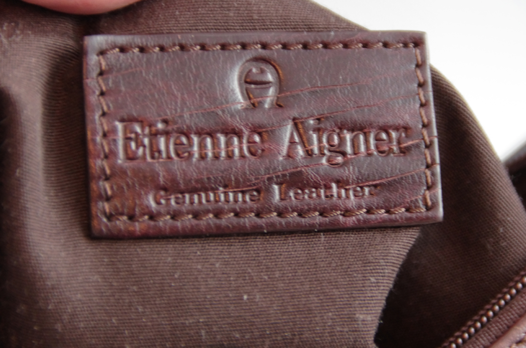 Etienne Aigners Designer Handbag and Matching Belt