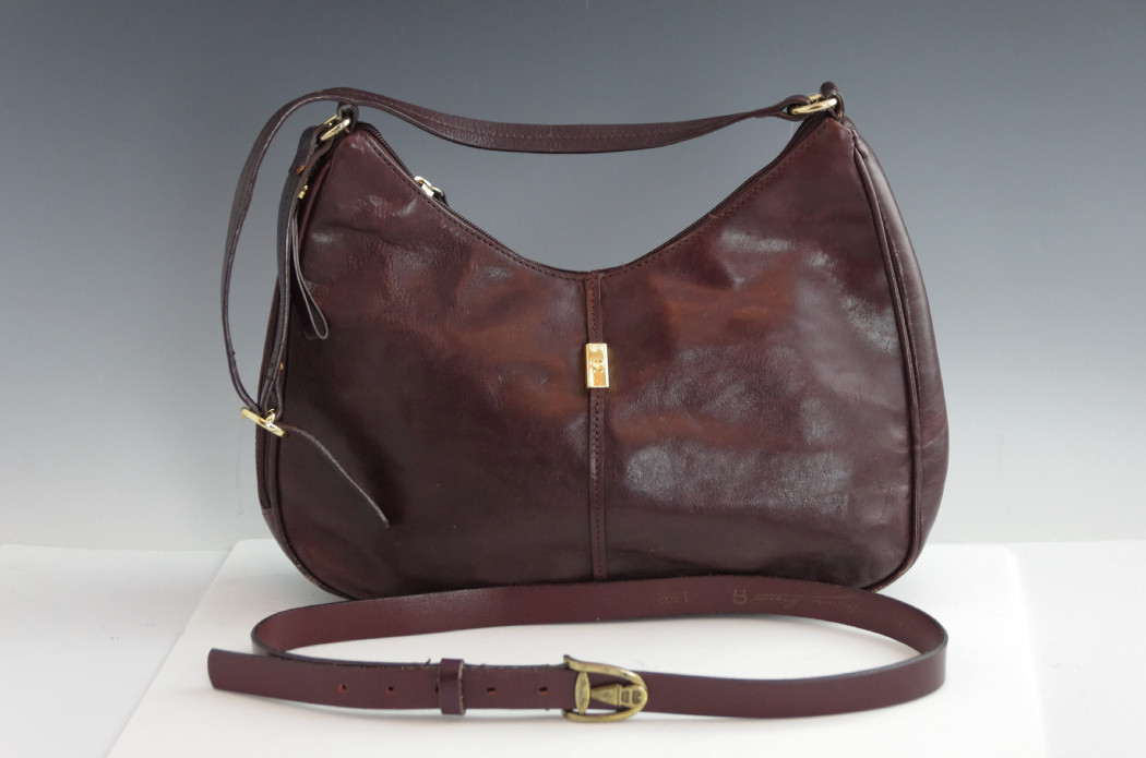 Etienne Aigners Designer Handbag and Matching Belt