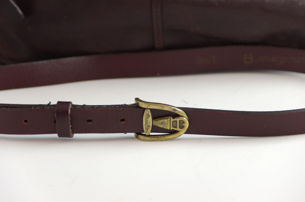 Etienne Aigners Designer Handbag and Matching Belt