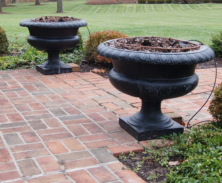 Pair of Black Urn-Shaped Concrete Planters