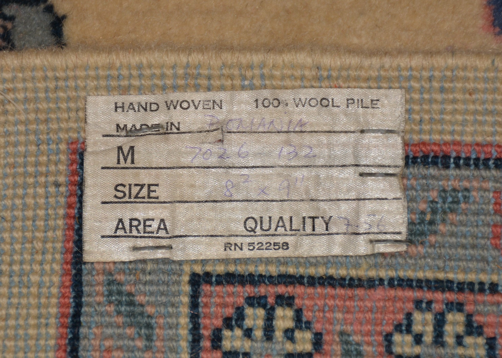 Cream, Pink, and Blue Oriental Area Rug