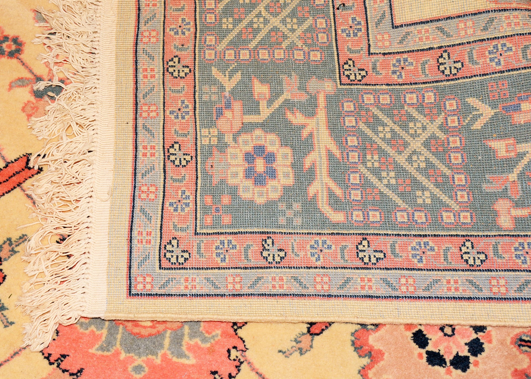 Cream, Pink, and Blue Oriental Area Rug