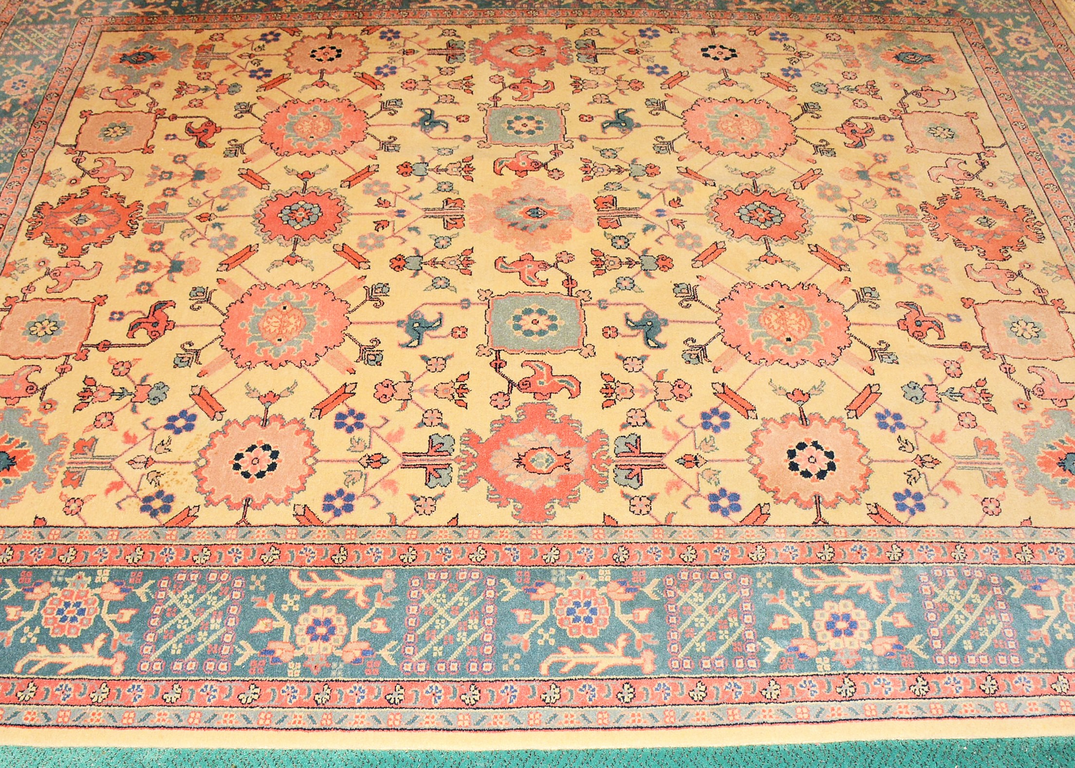 Cream, Pink, and Blue Oriental Area Rug