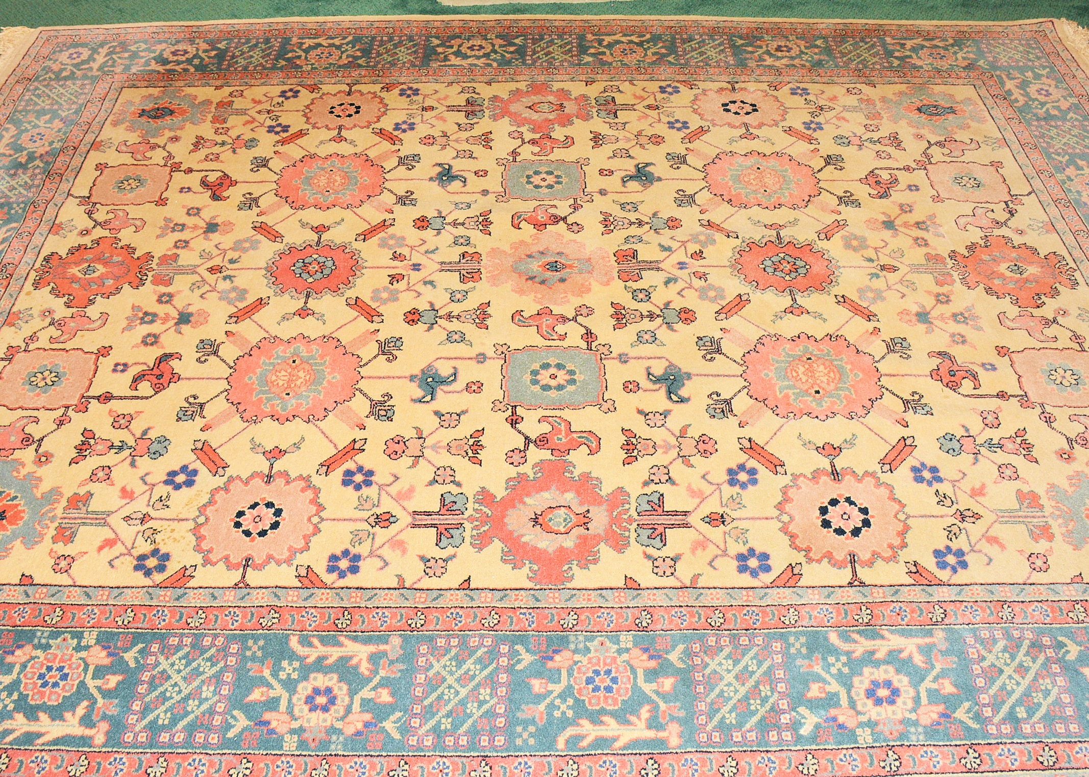 Cream, Pink, and Blue Oriental Area Rug