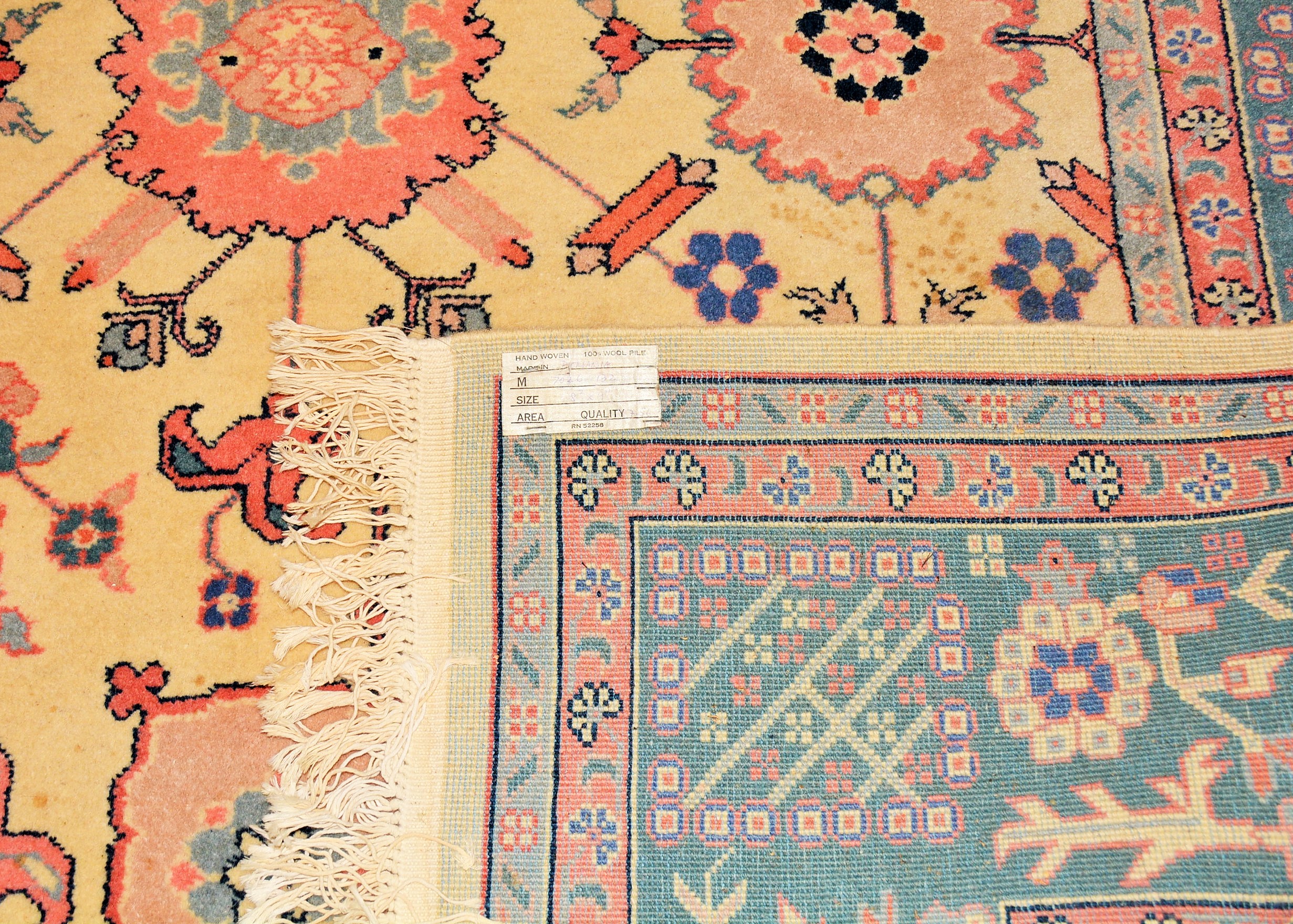 Cream, Pink, and Blue Oriental Area Rug