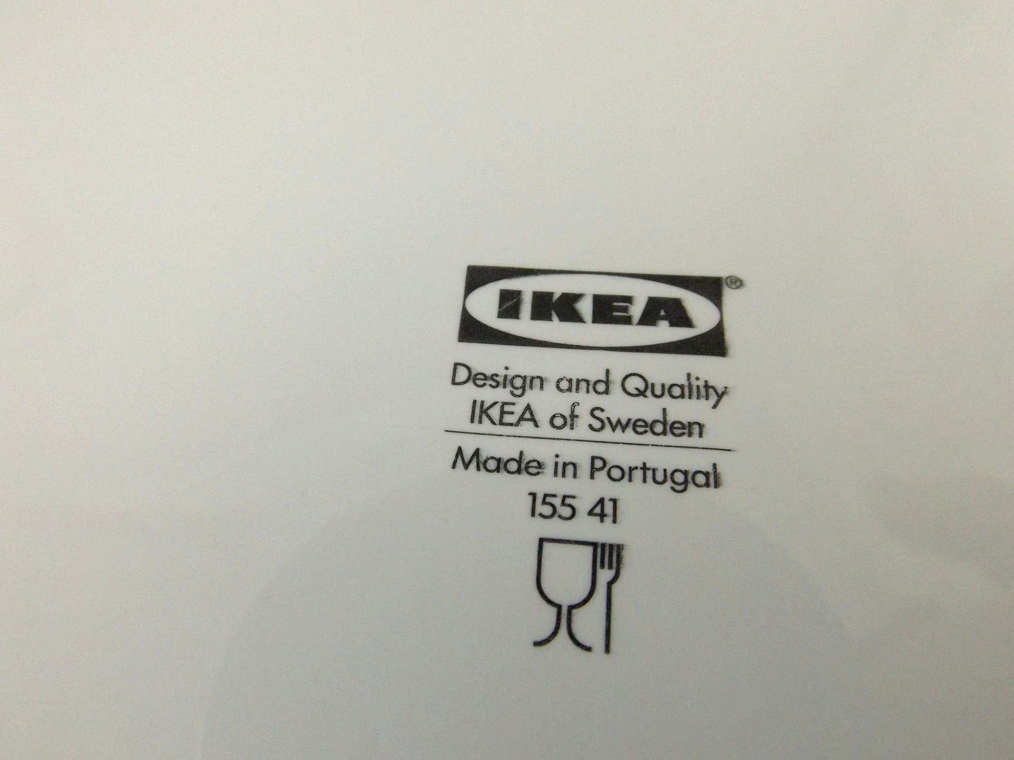 Ikea Black and White Ceramic Plate and White Tapered Vase