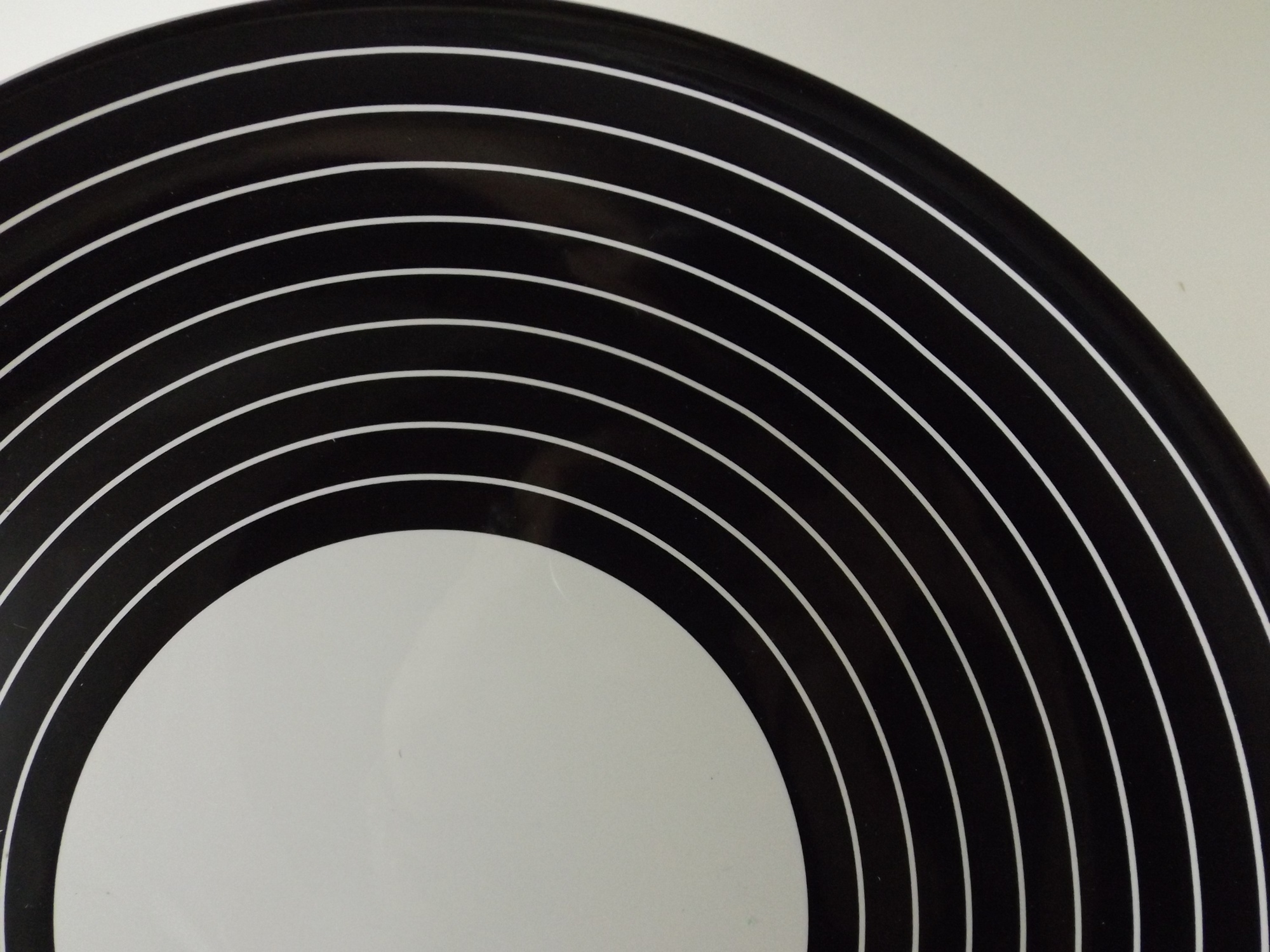 Ikea Black and White Ceramic Plate and White Tapered Vase