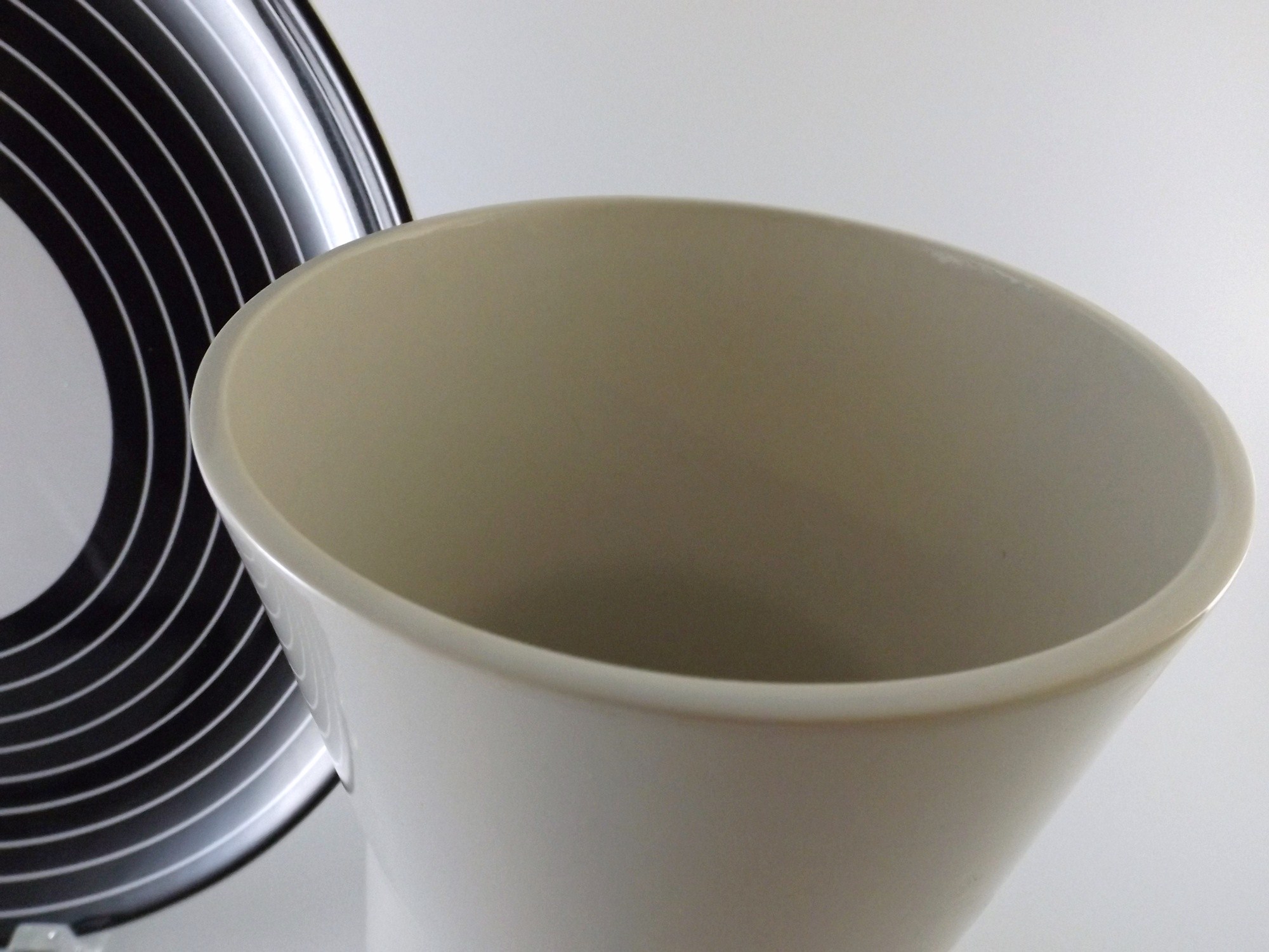 Ikea Black and White Ceramic Plate and White Tapered Vase