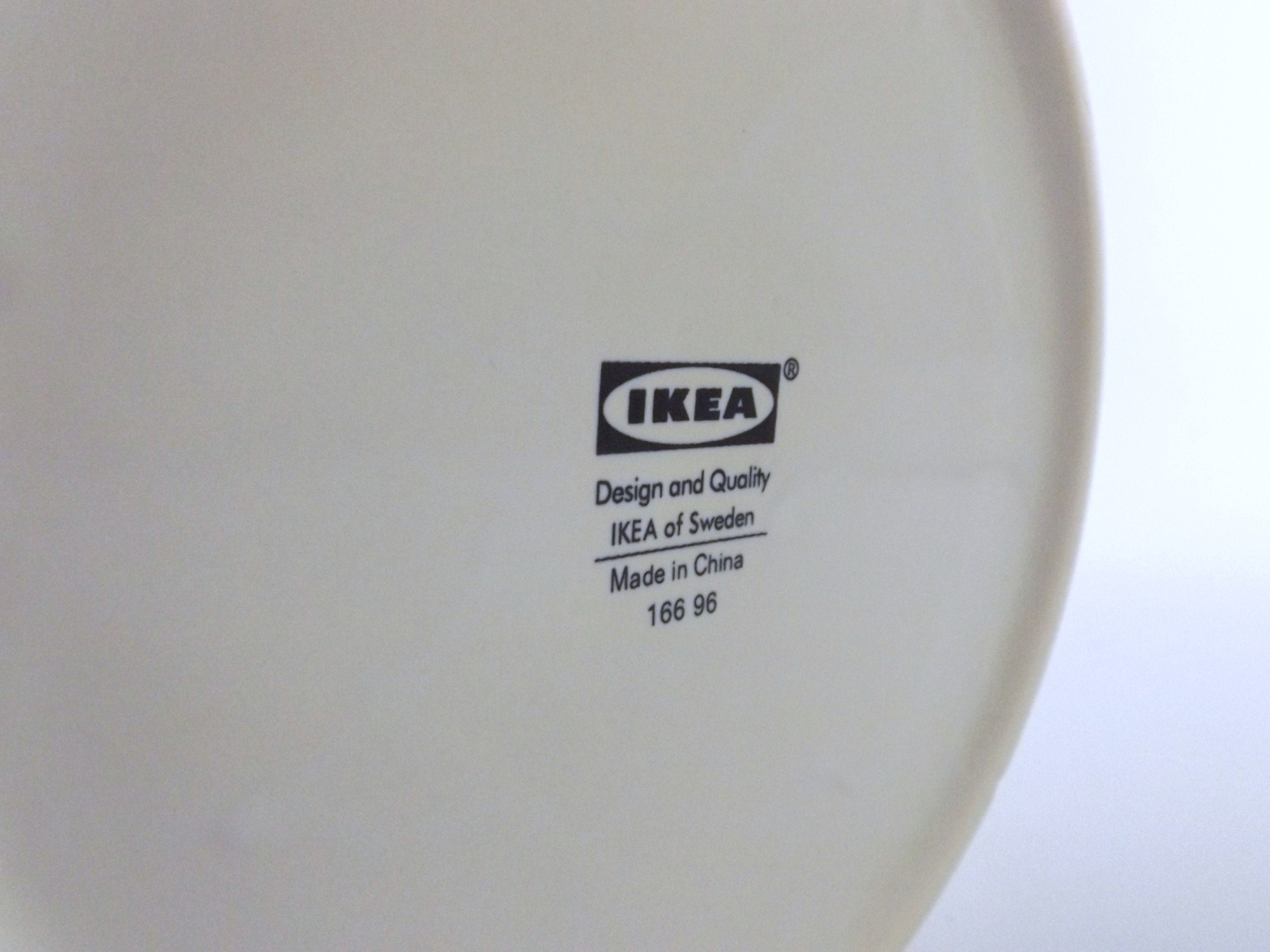 Ikea Black and White Ceramic Plate and White Tapered Vase