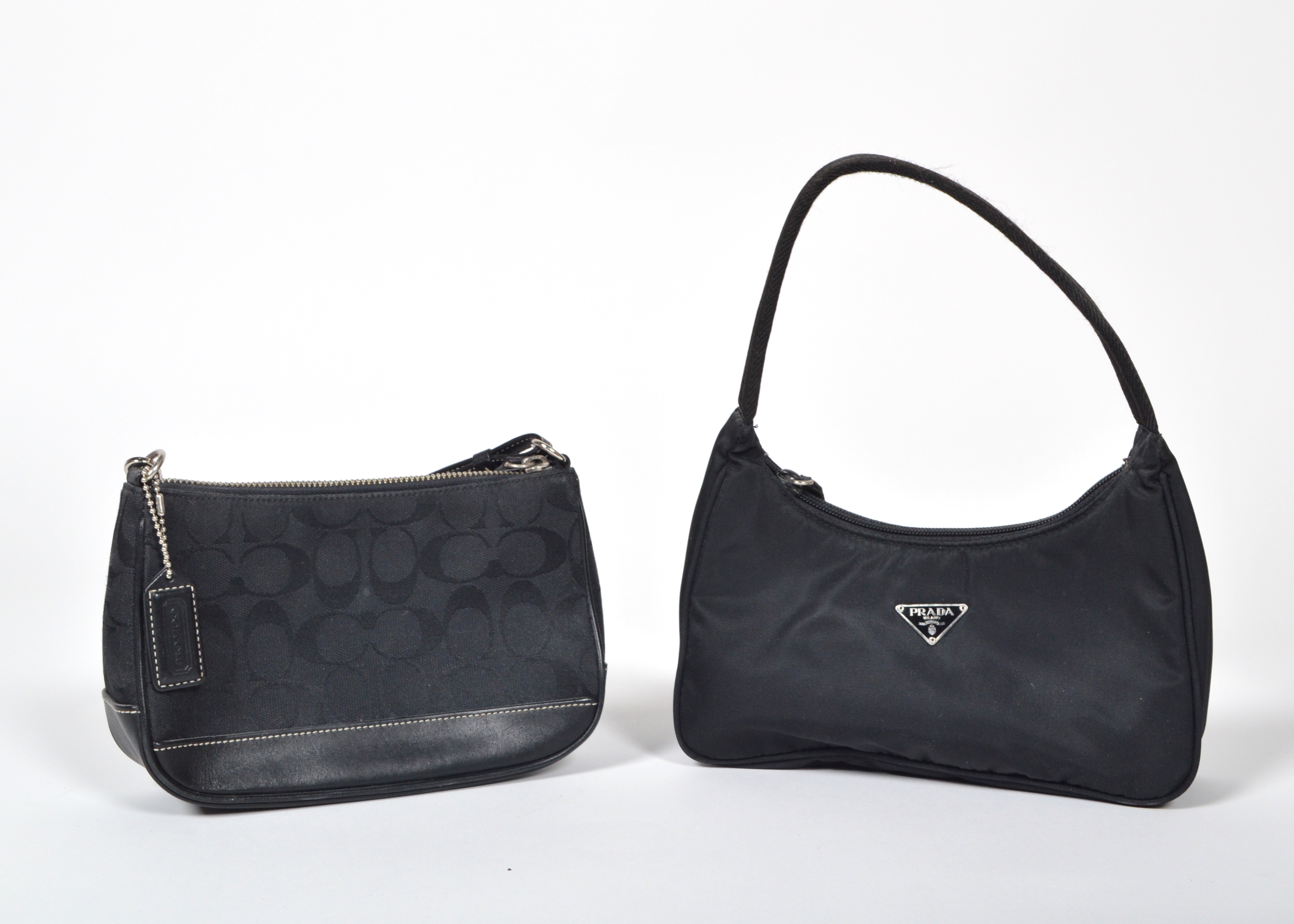 A Set of Two Black Designer Handbags