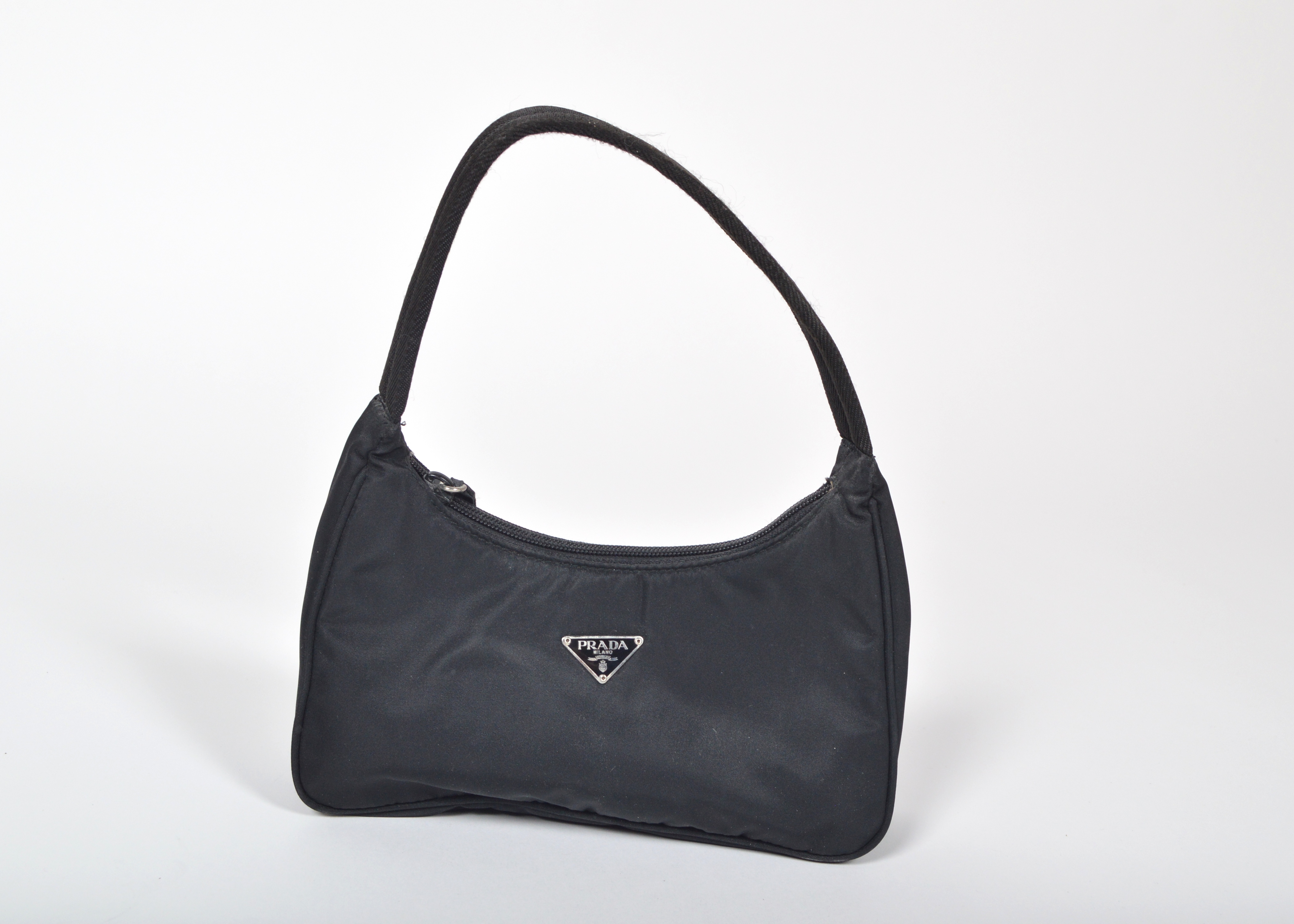 A Set of Two Black Designer Handbags